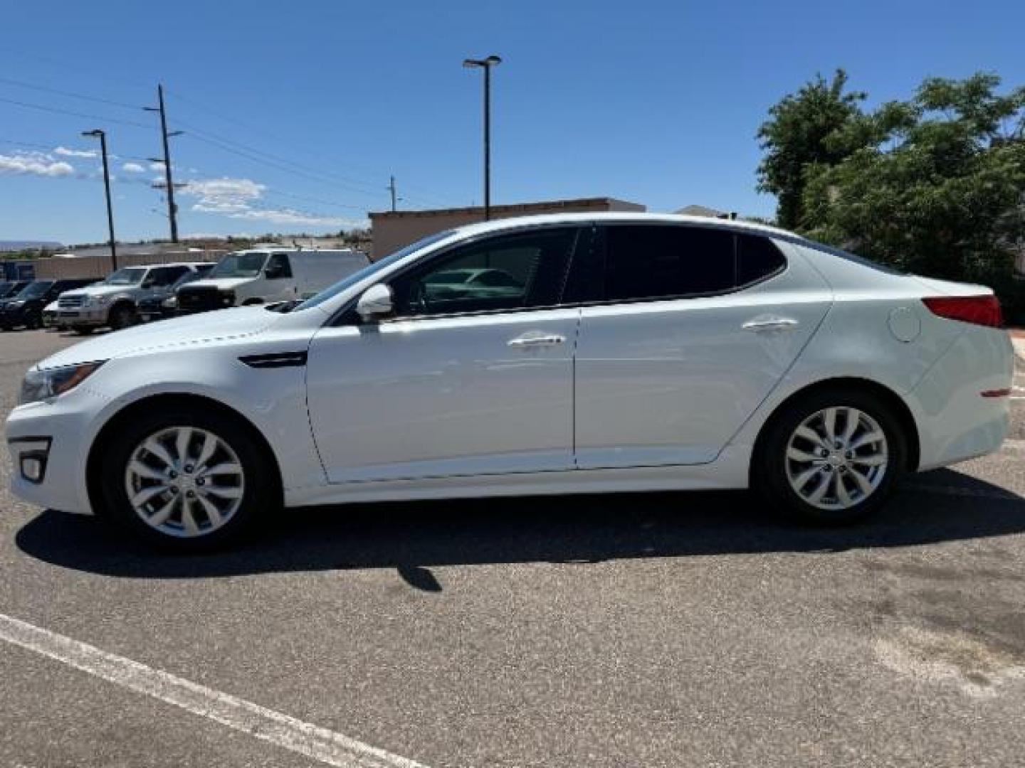 2015 Snow White Pearl /Black Interior Kia Optima EX (5XXGN4A79FG) with an 2.4L L4 DOHC 16V engine, 6-Speed Automatic transmission, located at 940 North Main Street, Cedar City, UT, 84720, (435) 628-0023, 37.692936, -113.061897 - We specialize in helping ALL people get the best financing available. No matter your credit score, good, bad or none we can get you an amazing rate. Had a bankruptcy, divorce, or repossessions? We give you the green light to get your credit back on the road. Low down and affordable payments that fit - Photo#3
