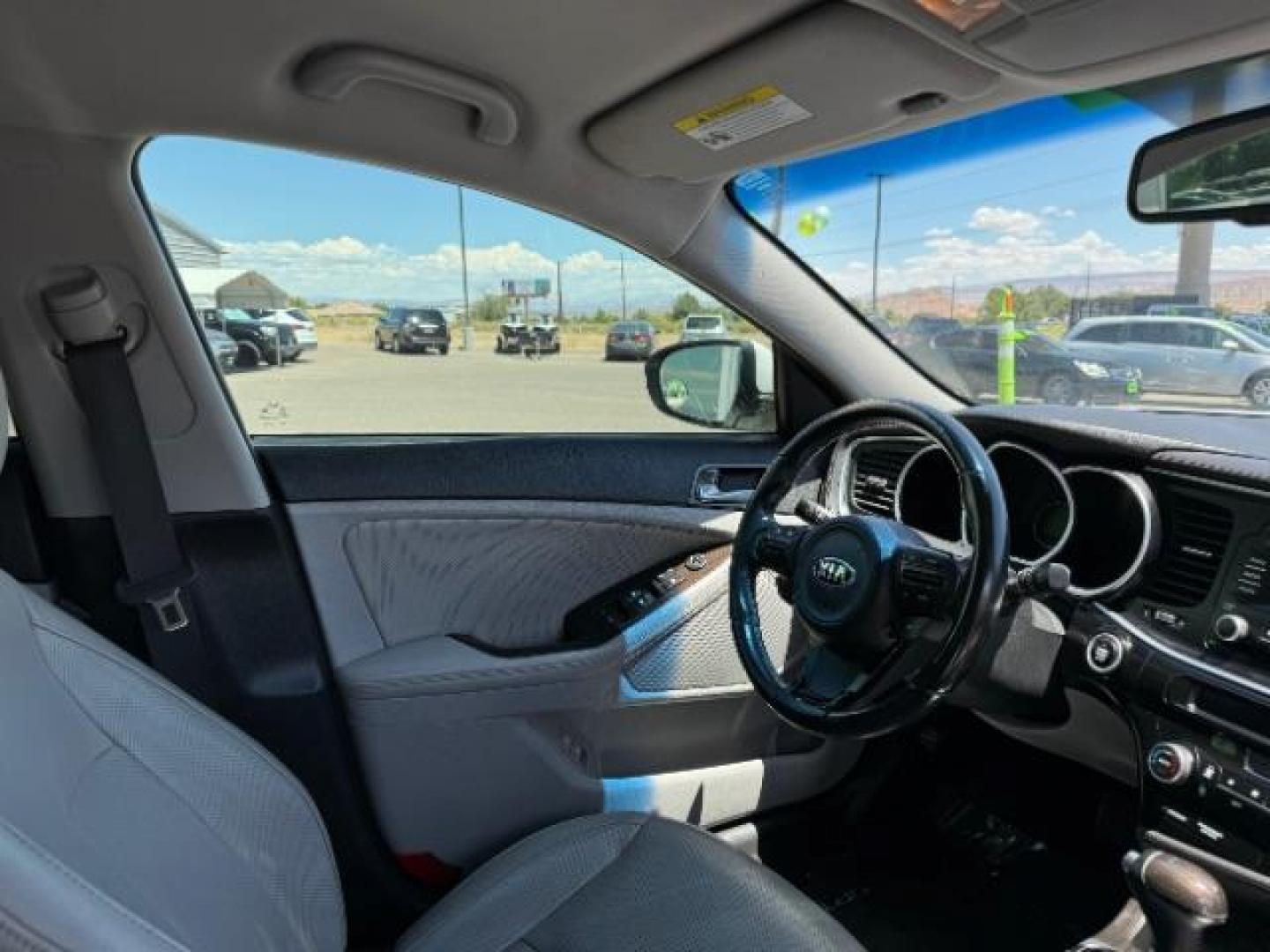 2015 Snow White Pearl /Black Interior Kia Optima EX (5XXGN4A79FG) with an 2.4L L4 DOHC 16V engine, 6-Speed Automatic transmission, located at 940 North Main Street, Cedar City, UT, 84720, (435) 628-0023, 37.692936, -113.061897 - We specialize in helping ALL people get the best financing available. No matter your credit score, good, bad or none we can get you an amazing rate. Had a bankruptcy, divorce, or repossessions? We give you the green light to get your credit back on the road. Low down and affordable payments that fit - Photo#31