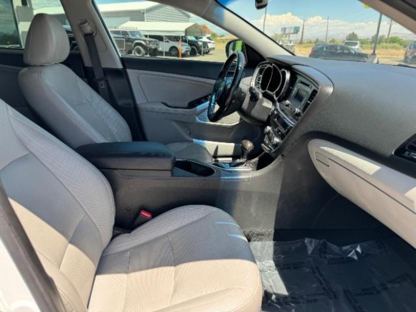 2015 Snow White Pearl /Black Interior Kia Optima EX (5XXGN4A79FG) with an 2.4L L4 DOHC 16V engine, 6-Speed Automatic transmission, located at 940 North Main Street, Cedar City, UT, 84720, (435) 628-0023, 37.692936, -113.061897 - We specialize in helping ALL people get the best financing available. No matter your credit score, good, bad or none we can get you an amazing rate. Had a bankruptcy, divorce, or repossessions? We give you the green light to get your credit back on the road. Low down and affordable payments that fit - Photo#30