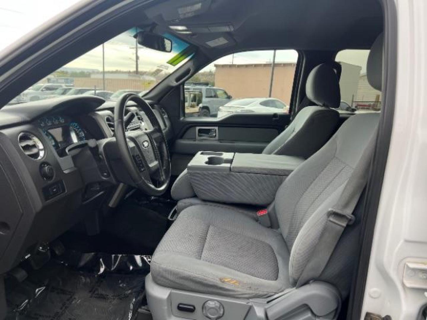 2011 Oxford White /Black Cloth Interior Ford F-150 FX2 SuperCrew 5.5-ft. Bed 2WD (1FTFW1CF0BF) with an 5.0L V8 engine, 6-Speed Automatic transmission, located at 1865 East Red Hills Pkwy, St. George, 84770, (435) 628-0023, 37.120850, -113.543640 - We specialize in helping ALL people get the best financing available. No matter your credit score, good, bad or none we can get you an amazing rate. Had a bankruptcy, divorce, or repossessions? We give you the green light to get your credit back on the road. Low down and affordable payments that fit - Photo#14