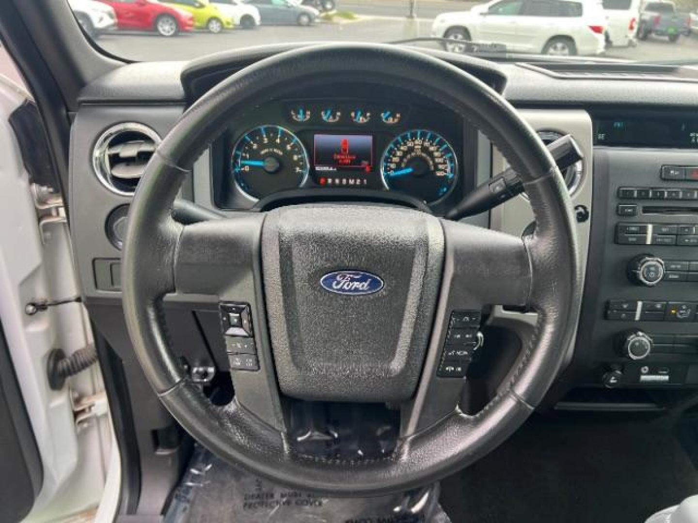 2011 Oxford White /Black Cloth Interior Ford F-150 FX2 SuperCrew 5.5-ft. Bed 2WD (1FTFW1CF0BF) with an 5.0L V8 engine, 6-Speed Automatic transmission, located at 1865 East Red Hills Pkwy, St. George, 84770, (435) 628-0023, 37.120850, -113.543640 - We specialize in helping ALL people get the best financing available. No matter your credit score, good, bad or none we can get you an amazing rate. Had a bankruptcy, divorce, or repossessions? We give you the green light to get your credit back on the road. Low down and affordable payments that fit - Photo#15