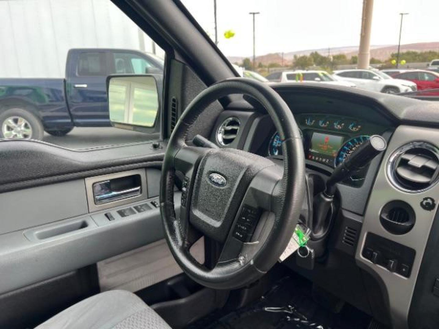 2011 Oxford White /Black Cloth Interior Ford F-150 FX2 SuperCrew 5.5-ft. Bed 2WD (1FTFW1CF0BF) with an 5.0L V8 engine, 6-Speed Automatic transmission, located at 1865 East Red Hills Pkwy, St. George, 84770, (435) 628-0023, 37.120850, -113.543640 - We specialize in helping ALL people get the best financing available. No matter your credit score, good, bad or none we can get you an amazing rate. Had a bankruptcy, divorce, or repossessions? We give you the green light to get your credit back on the road. Low down and affordable payments that fit - Photo#29