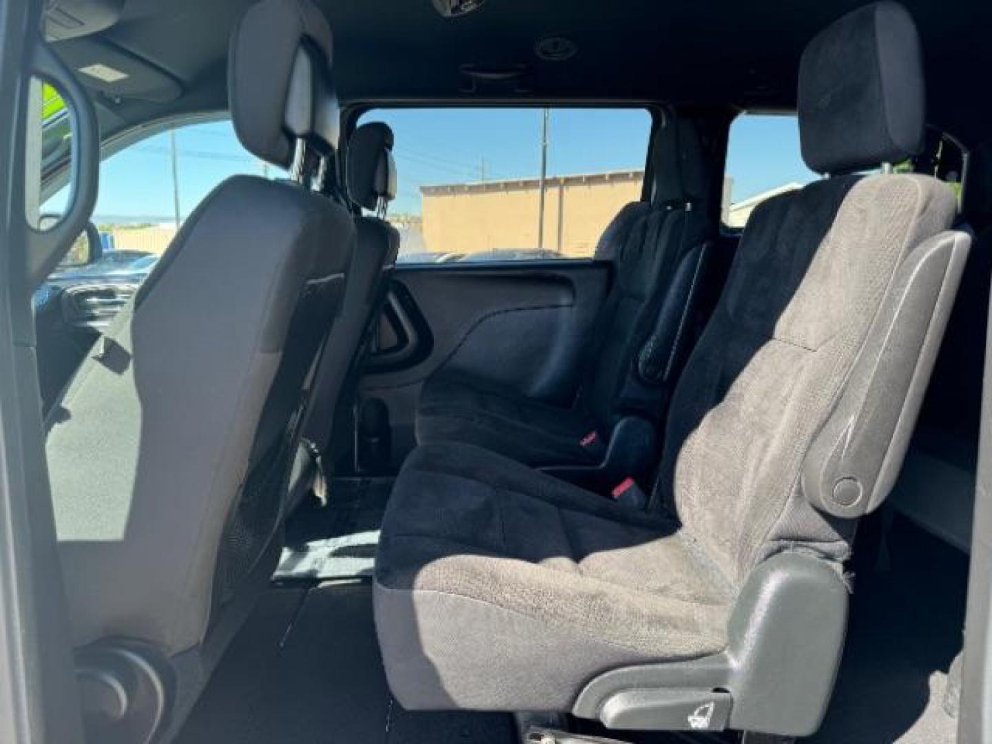 2018 Billet Clear Coat /Black/Light Graystone, cloth Dodge Grand Caravan SE (2C4RDGBG9JR) with an 3.6L V6 DOHC 24V engine, 6-Speed Automatic transmission, located at 940 North Main Street, Cedar City, UT, 84720, (435) 628-0023, 37.692936, -113.061897 - We specialize in helping ALL people get the best financing available. No matter your credit score, good, bad or none we can get you an amazing rate. Had a bankruptcy, divorce, or repossessions? We give you the green light to get your credit back on the road. Low down and affordable payments that fit - Photo#19