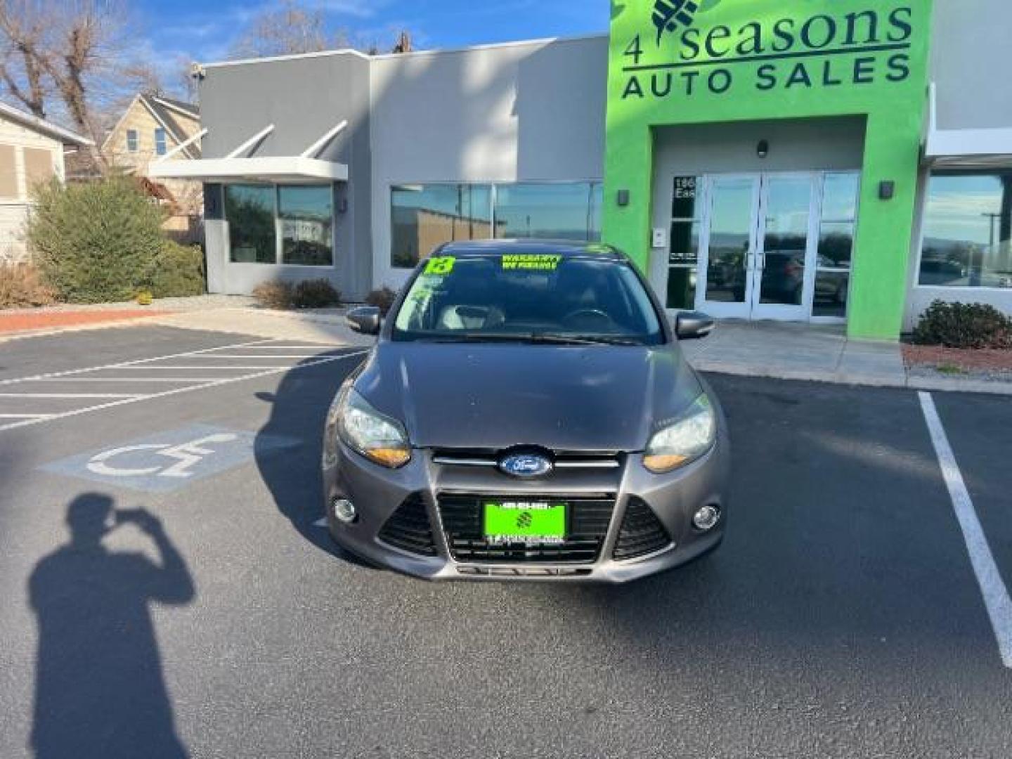 2013 Gray /Charcoal Black Ford Focus Titanium Hatch (1FADP3N23DL) with an 2.0L L4 DOHC 16V engine, 6-Speed Automatic transmission, located at 940 North Main Street, Cedar City, UT, 84720, (435) 628-0023, 37.692936, -113.061897 - We specialize in helping ALL people get the best financing available. No matter your credit score, good, bad or none we can get you an amazing rate. Had a bankruptcy, divorce, or repossessions? We give you the green light to get your credit back on the road. Low down and affordable payments that fit - Photo#1