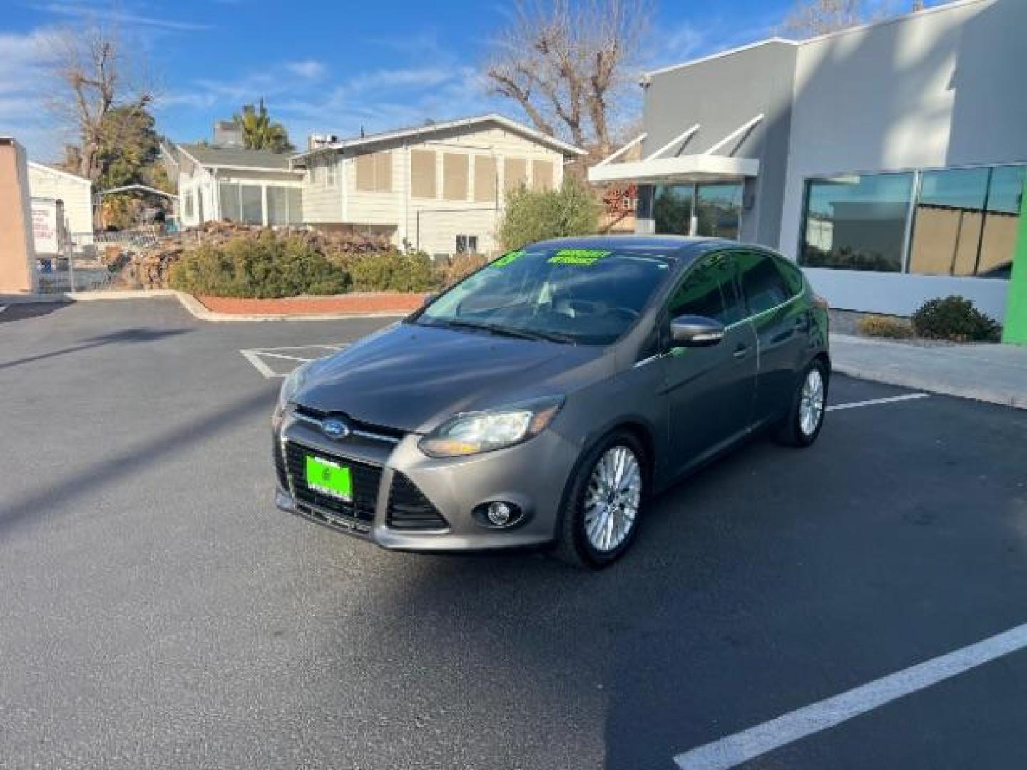 2013 Gray /Charcoal Black Ford Focus Titanium Hatch (1FADP3N23DL) with an 2.0L L4 DOHC 16V engine, 6-Speed Automatic transmission, located at 940 North Main Street, Cedar City, UT, 84720, (435) 628-0023, 37.692936, -113.061897 - We specialize in helping ALL people get the best financing available. No matter your credit score, good, bad or none we can get you an amazing rate. Had a bankruptcy, divorce, or repossessions? We give you the green light to get your credit back on the road. Low down and affordable payments that fit - Photo#2