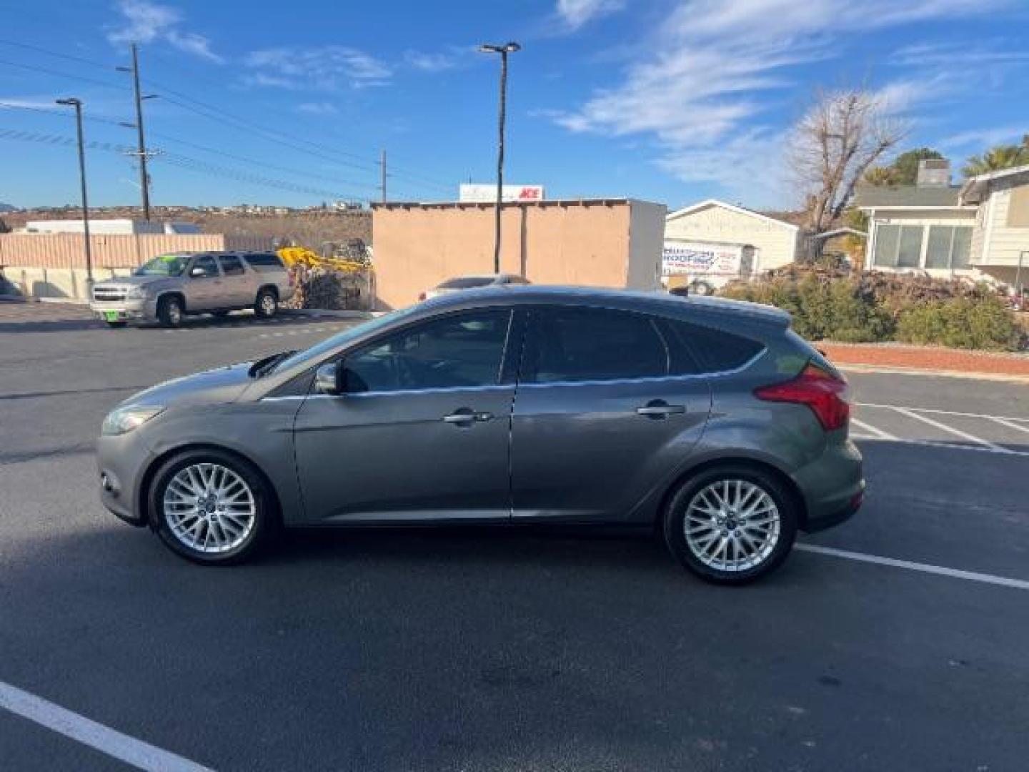 2013 Gray /Charcoal Black Ford Focus Titanium Hatch (1FADP3N23DL) with an 2.0L L4 DOHC 16V engine, 6-Speed Automatic transmission, located at 940 North Main Street, Cedar City, UT, 84720, (435) 628-0023, 37.692936, -113.061897 - We specialize in helping ALL people get the best financing available. No matter your credit score, good, bad or none we can get you an amazing rate. Had a bankruptcy, divorce, or repossessions? We give you the green light to get your credit back on the road. Low down and affordable payments that fit - Photo#3