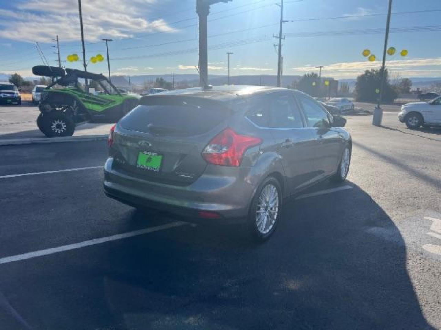 2013 Gray /Charcoal Black Ford Focus Titanium Hatch (1FADP3N23DL) with an 2.0L L4 DOHC 16V engine, 6-Speed Automatic transmission, located at 940 North Main Street, Cedar City, UT, 84720, (435) 628-0023, 37.692936, -113.061897 - We specialize in helping ALL people get the best financing available. No matter your credit score, good, bad or none we can get you an amazing rate. Had a bankruptcy, divorce, or repossessions? We give you the green light to get your credit back on the road. Low down and affordable payments that fit - Photo#6