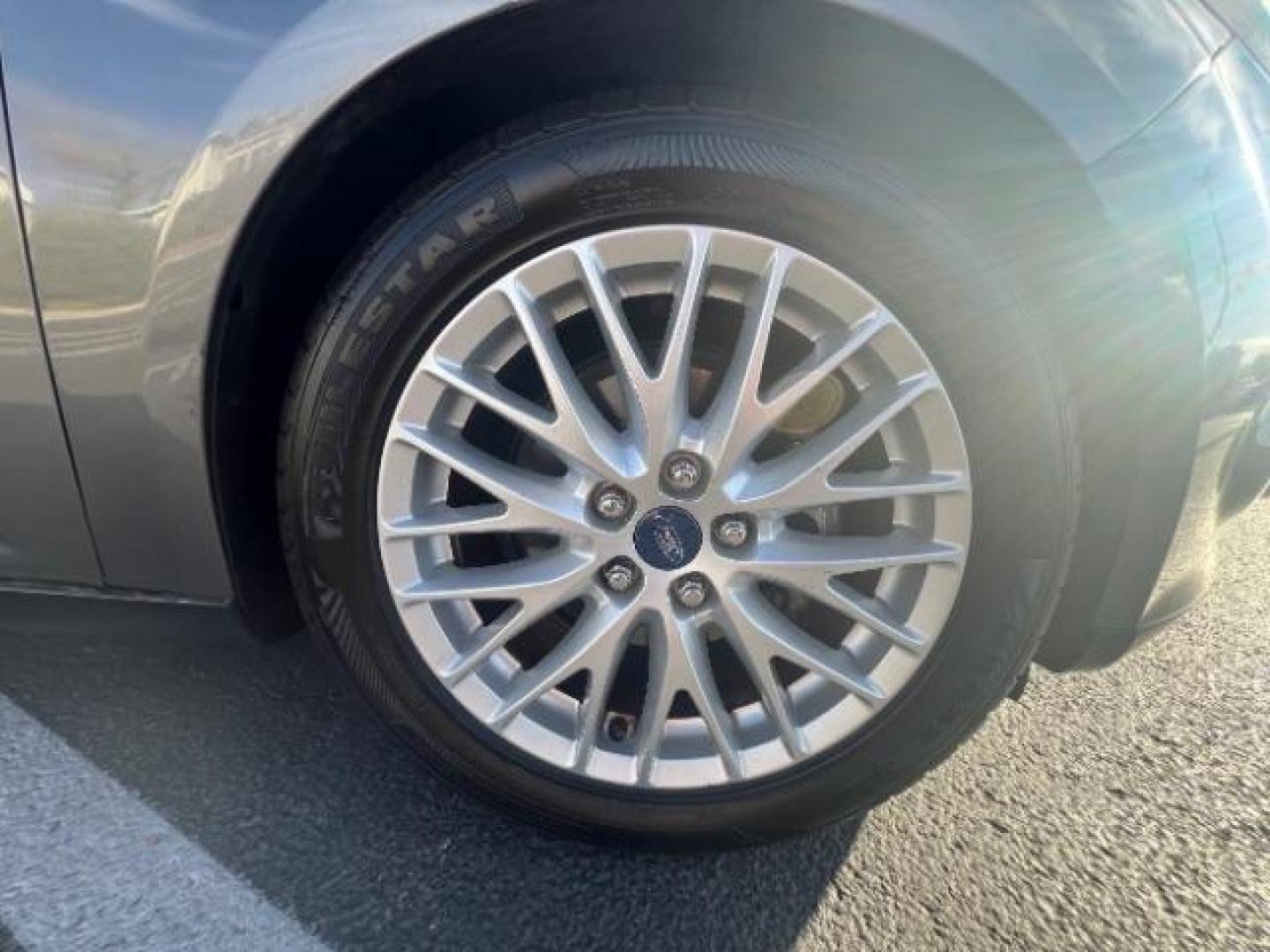 2013 Gray /Charcoal Black Ford Focus Titanium Hatch (1FADP3N23DL) with an 2.0L L4 DOHC 16V engine, 6-Speed Automatic transmission, located at 940 North Main Street, Cedar City, UT, 84720, (435) 628-0023, 37.692936, -113.061897 - We specialize in helping ALL people get the best financing available. No matter your credit score, good, bad or none we can get you an amazing rate. Had a bankruptcy, divorce, or repossessions? We give you the green light to get your credit back on the road. Low down and affordable payments that fit - Photo#8