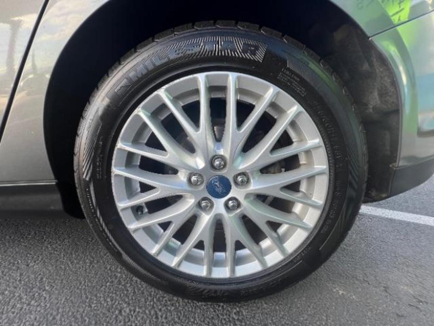 2013 Gray /Charcoal Black Ford Focus Titanium Hatch (1FADP3N23DL) with an 2.0L L4 DOHC 16V engine, 6-Speed Automatic transmission, located at 940 North Main Street, Cedar City, UT, 84720, (435) 628-0023, 37.692936, -113.061897 - We specialize in helping ALL people get the best financing available. No matter your credit score, good, bad or none we can get you an amazing rate. Had a bankruptcy, divorce, or repossessions? We give you the green light to get your credit back on the road. Low down and affordable payments that fit - Photo#10