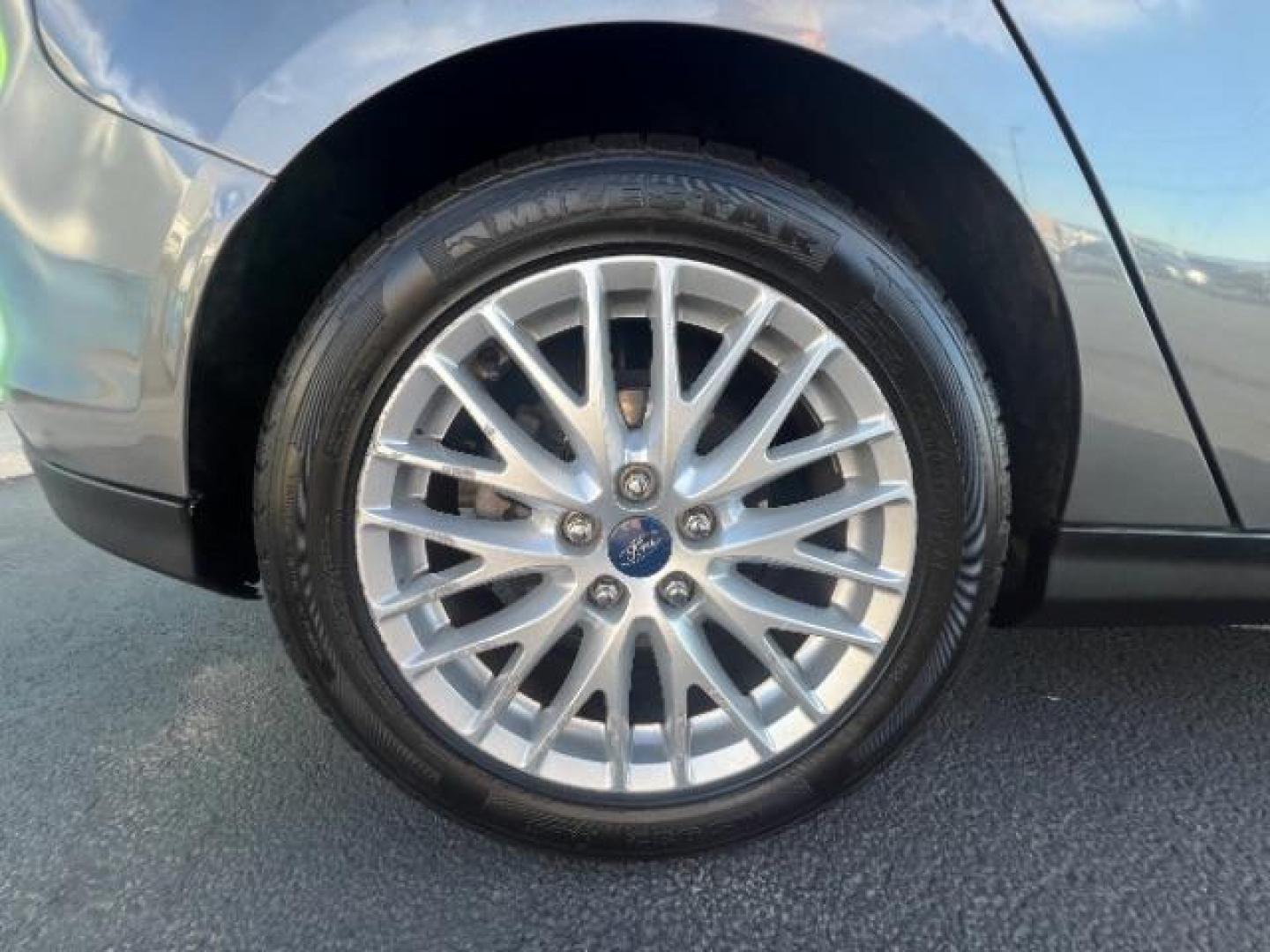 2013 Gray /Charcoal Black Ford Focus Titanium Hatch (1FADP3N23DL) with an 2.0L L4 DOHC 16V engine, 6-Speed Automatic transmission, located at 940 North Main Street, Cedar City, UT, 84720, (435) 628-0023, 37.692936, -113.061897 - We specialize in helping ALL people get the best financing available. No matter your credit score, good, bad or none we can get you an amazing rate. Had a bankruptcy, divorce, or repossessions? We give you the green light to get your credit back on the road. Low down and affordable payments that fit - Photo#11