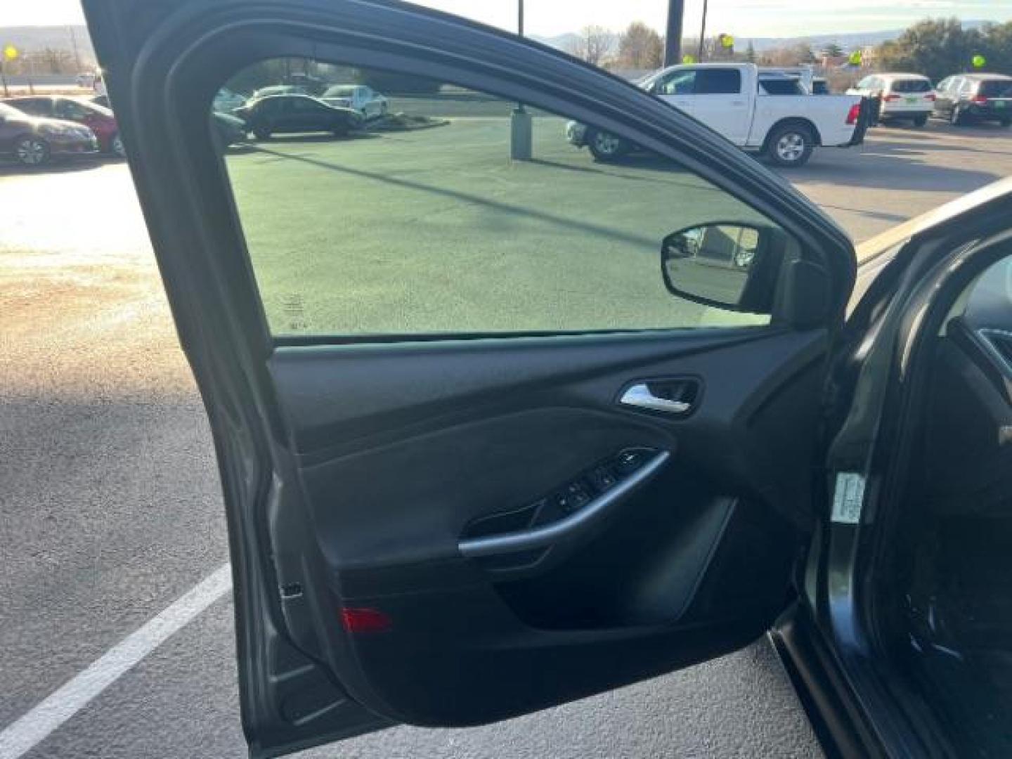 2013 Gray /Charcoal Black Ford Focus Titanium Hatch (1FADP3N23DL) with an 2.0L L4 DOHC 16V engine, 6-Speed Automatic transmission, located at 940 North Main Street, Cedar City, UT, 84720, (435) 628-0023, 37.692936, -113.061897 - We specialize in helping ALL people get the best financing available. No matter your credit score, good, bad or none we can get you an amazing rate. Had a bankruptcy, divorce, or repossessions? We give you the green light to get your credit back on the road. Low down and affordable payments that fit - Photo#12