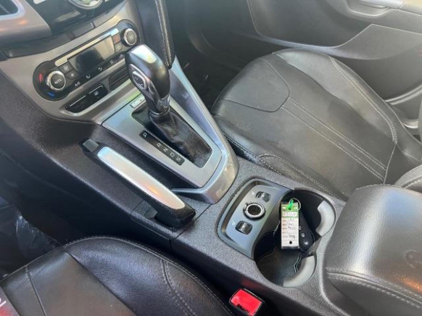 2013 Gray /Charcoal Black Ford Focus Titanium Hatch (1FADP3N23DL) with an 2.0L L4 DOHC 16V engine, 6-Speed Automatic transmission, located at 940 North Main Street, Cedar City, UT, 84720, (435) 628-0023, 37.692936, -113.061897 - We specialize in helping ALL people get the best financing available. No matter your credit score, good, bad or none we can get you an amazing rate. Had a bankruptcy, divorce, or repossessions? We give you the green light to get your credit back on the road. Low down and affordable payments that fit - Photo#19
