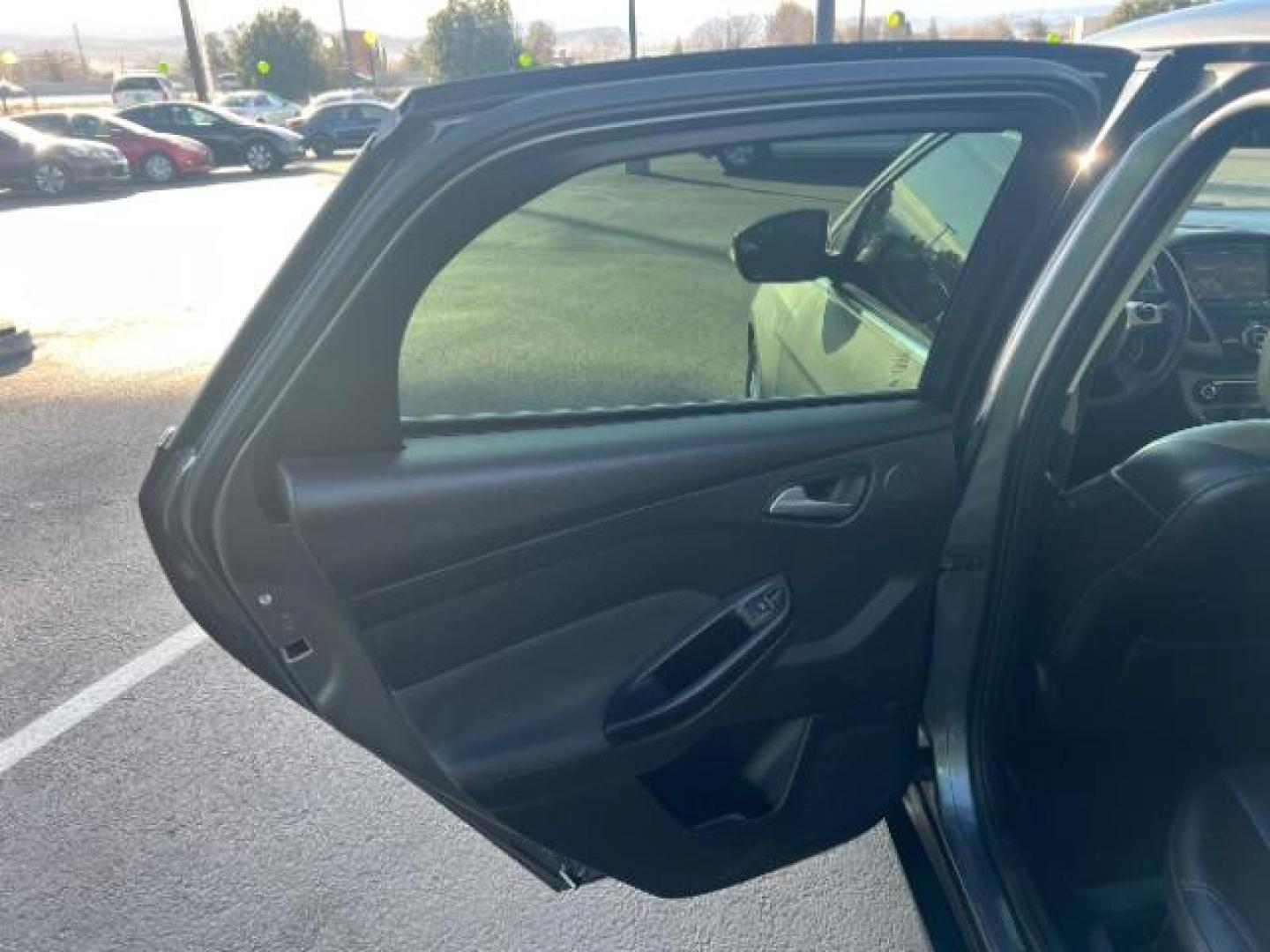 2013 Gray /Charcoal Black Ford Focus Titanium Hatch (1FADP3N23DL) with an 2.0L L4 DOHC 16V engine, 6-Speed Automatic transmission, located at 940 North Main Street, Cedar City, UT, 84720, (435) 628-0023, 37.692936, -113.061897 - We specialize in helping ALL people get the best financing available. No matter your credit score, good, bad or none we can get you an amazing rate. Had a bankruptcy, divorce, or repossessions? We give you the green light to get your credit back on the road. Low down and affordable payments that fit - Photo#21