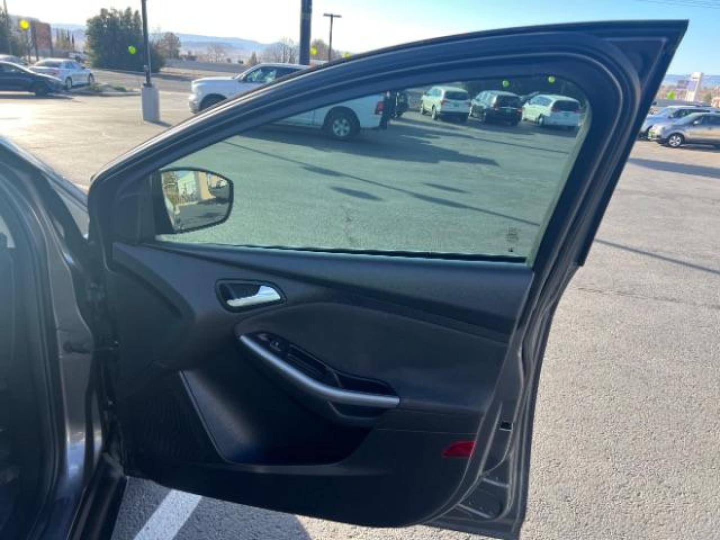 2013 Gray /Charcoal Black Ford Focus Titanium Hatch (1FADP3N23DL) with an 2.0L L4 DOHC 16V engine, 6-Speed Automatic transmission, located at 940 North Main Street, Cedar City, UT, 84720, (435) 628-0023, 37.692936, -113.061897 - We specialize in helping ALL people get the best financing available. No matter your credit score, good, bad or none we can get you an amazing rate. Had a bankruptcy, divorce, or repossessions? We give you the green light to get your credit back on the road. Low down and affordable payments that fit - Photo#29