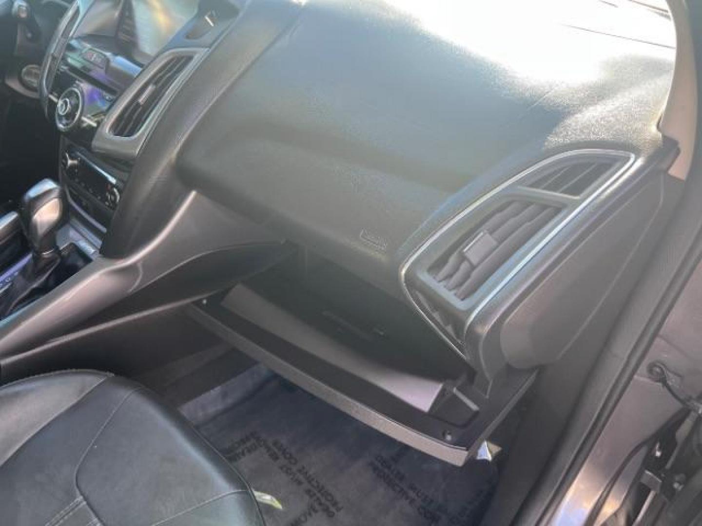 2013 Gray /Charcoal Black Ford Focus Titanium Hatch (1FADP3N23DL) with an 2.0L L4 DOHC 16V engine, 6-Speed Automatic transmission, located at 940 North Main Street, Cedar City, UT, 84720, (435) 628-0023, 37.692936, -113.061897 - We specialize in helping ALL people get the best financing available. No matter your credit score, good, bad or none we can get you an amazing rate. Had a bankruptcy, divorce, or repossessions? We give you the green light to get your credit back on the road. Low down and affordable payments that fit - Photo#31