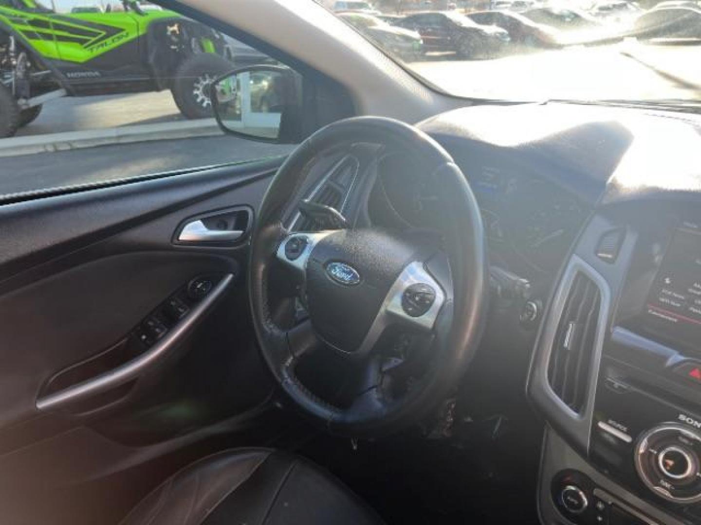 2013 Gray /Charcoal Black Ford Focus Titanium Hatch (1FADP3N23DL) with an 2.0L L4 DOHC 16V engine, 6-Speed Automatic transmission, located at 940 North Main Street, Cedar City, UT, 84720, (435) 628-0023, 37.692936, -113.061897 - We specialize in helping ALL people get the best financing available. No matter your credit score, good, bad or none we can get you an amazing rate. Had a bankruptcy, divorce, or repossessions? We give you the green light to get your credit back on the road. Low down and affordable payments that fit - Photo#32