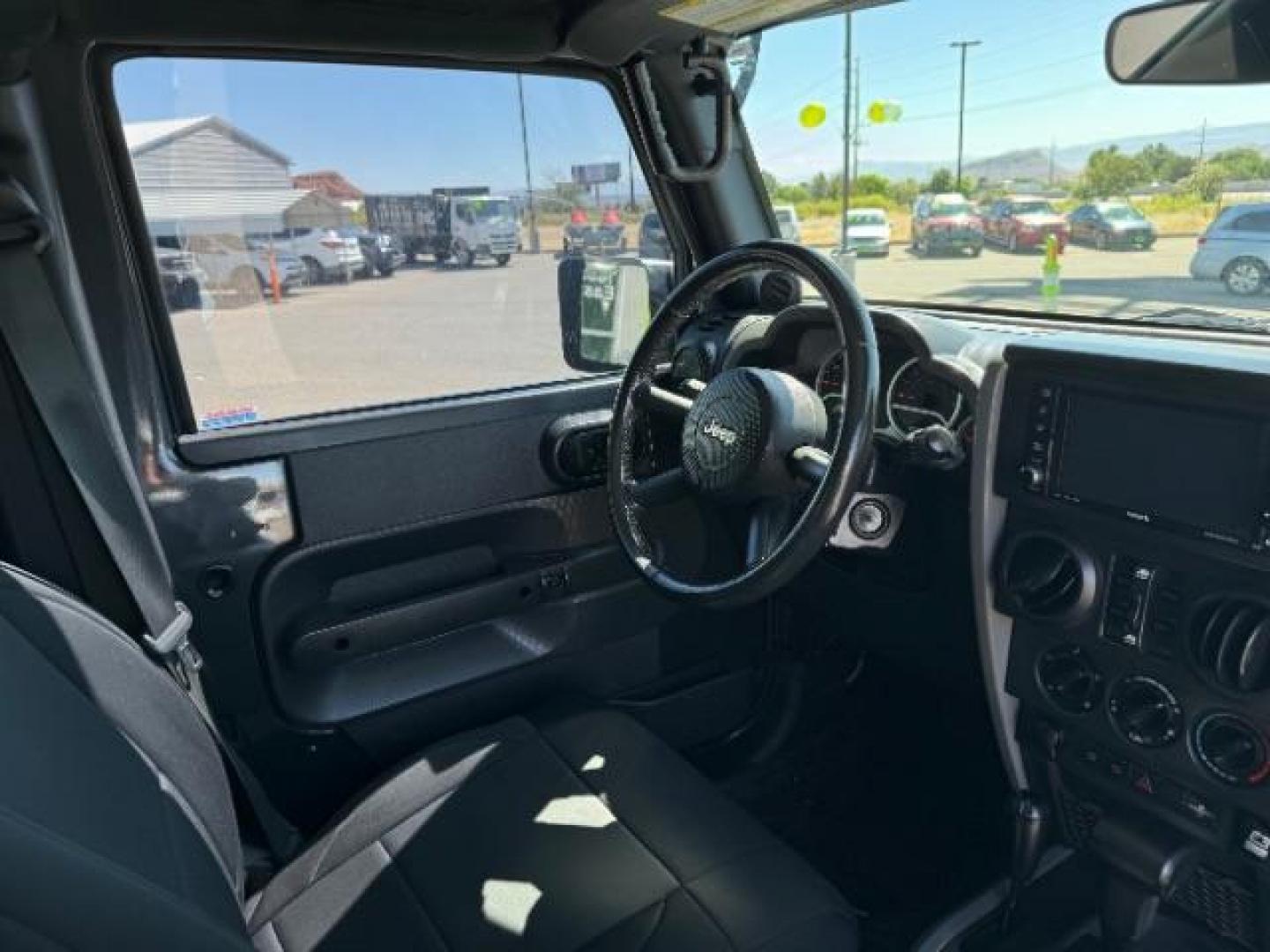 2010 Dark Charcoal Pearl with Black Hard Top /Dark Slate Gray/Medium Slate Gray Cloth Interior Jeep Wrangler Unlimited Rubicon 4WD (1J4BA6H12AL) with an 3.8L V6 OHV 12V engine, 4-Speed Automatic transmission, located at 1865 East Red Hills Pkwy, St. George, 84770, (435) 628-0023, 37.120850, -113.543640 - Photo#31