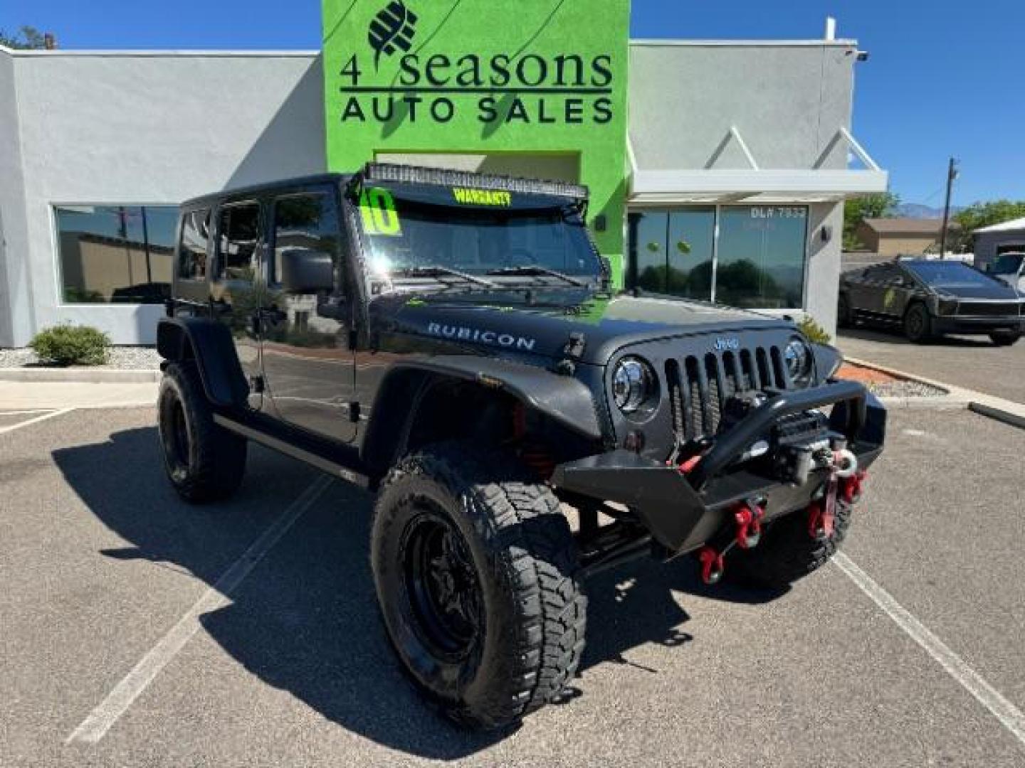 2010 Dark Charcoal Pearl with Black Hard Top /Dark Slate Gray/Medium Slate Gray Cloth Interior Jeep Wrangler Unlimited Rubicon 4WD (1J4BA6H12AL) with an 3.8L V6 OHV 12V engine, 4-Speed Automatic transmission, located at 1865 East Red Hills Pkwy, St. George, 84770, (435) 628-0023, 37.120850, -113.543640 - Photo#0