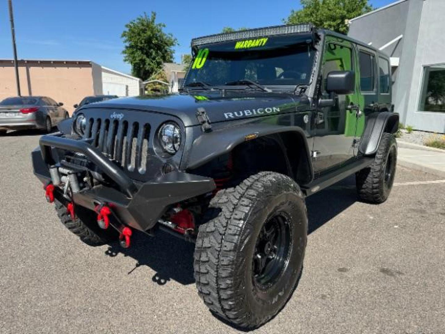 2010 Dark Charcoal Pearl with Black Hard Top /Dark Slate Gray/Medium Slate Gray Cloth Interior Jeep Wrangler Unlimited Rubicon 4WD (1J4BA6H12AL) with an 3.8L V6 OHV 12V engine, 4-Speed Automatic transmission, located at 1865 East Red Hills Pkwy, St. George, 84770, (435) 628-0023, 37.120850, -113.543640 - Photo#2