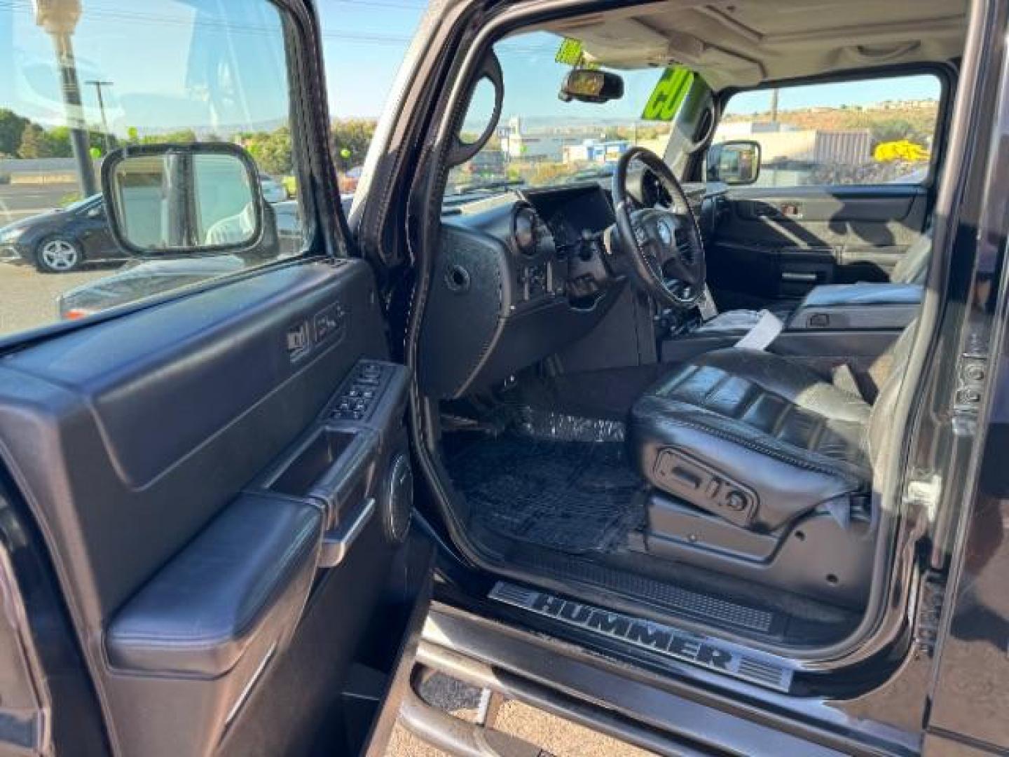 2005 Black /Ebony Leather Interior Hummer H2 SUV (5GRGN23U25H) with an 6.0L V8 OHV 16V engine, 4-Speed Automatic transmission, located at 1865 East Red Hills Pkwy, St. George, 84770, (435) 628-0023, 37.120850, -113.543640 - Photo#12