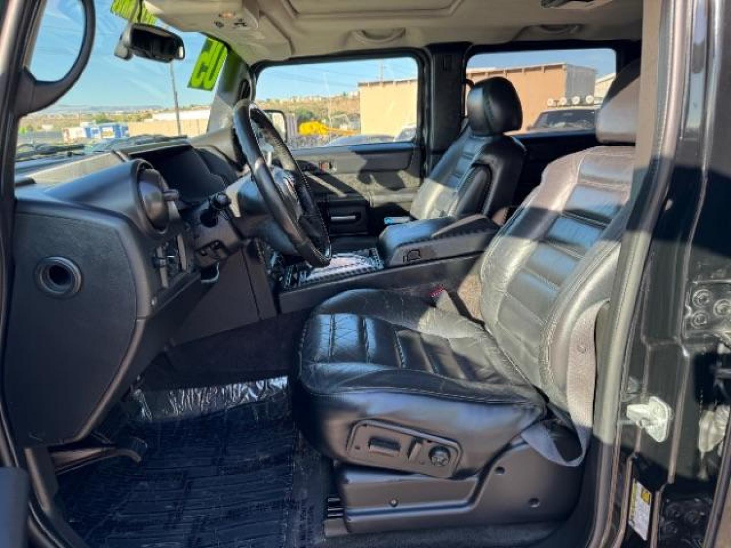 2005 Black /Ebony Leather Interior Hummer H2 SUV (5GRGN23U25H) with an 6.0L V8 OHV 16V engine, 4-Speed Automatic transmission, located at 1865 East Red Hills Pkwy, St. George, 84770, (435) 628-0023, 37.120850, -113.543640 - Photo#14