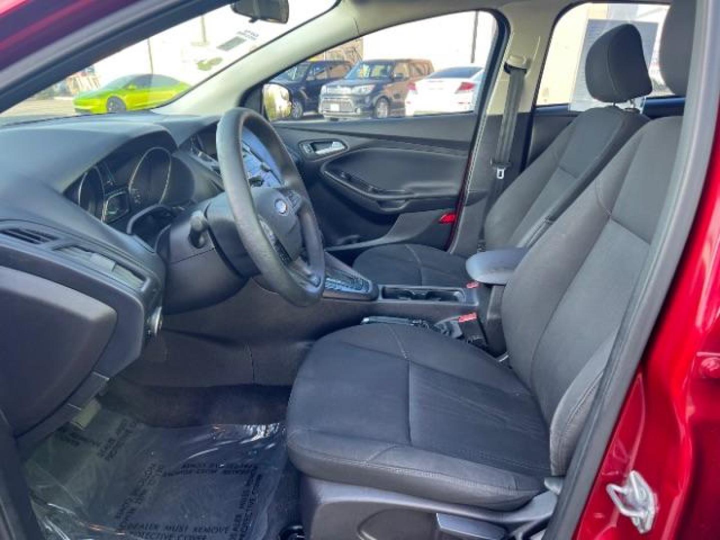 2015 Ruby Red Metallic Tinted Clearcoat /Charcoal Black Insert w/Warm Steel Surround, cloth Ford Focus SE Hatch (1FADP3K21FL) with an 2.0L L4 DOHC 16V engine, 4-Speed Automatic transmission, located at 1865 East Red Hills Pkwy, St. George, 84770, (435) 628-0023, 37.120850, -113.543640 - We specialize in helping ALL people get the best financing available. No matter your credit score, good, bad or none we can get you an amazing rate. Had a bankruptcy, divorce, or repossessions? We give you the green light to get your credit back on the road. Low down and affordable payments that fit - Photo#14