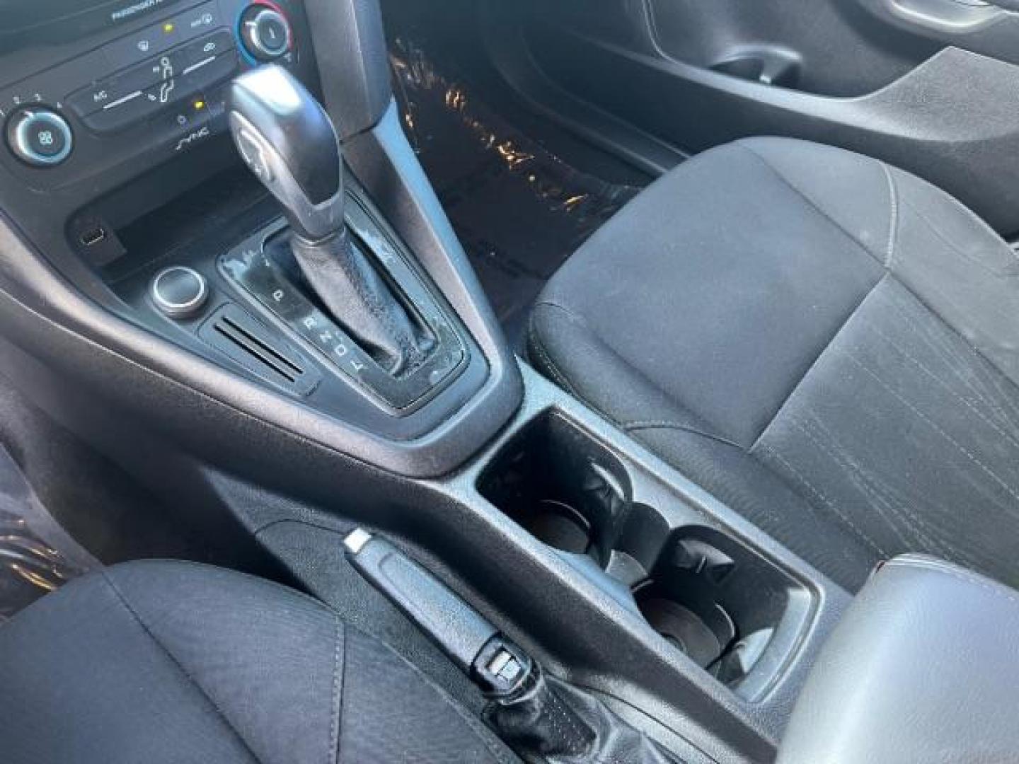 2015 Ruby Red Metallic Tinted Clearcoat /Charcoal Black Insert w/Warm Steel Surround, cloth Ford Focus SE Hatch (1FADP3K21FL) with an 2.0L L4 DOHC 16V engine, 4-Speed Automatic transmission, located at 1865 East Red Hills Pkwy, St. George, 84770, (435) 628-0023, 37.120850, -113.543640 - We specialize in helping ALL people get the best financing available. No matter your credit score, good, bad or none we can get you an amazing rate. Had a bankruptcy, divorce, or repossessions? We give you the green light to get your credit back on the road. Low down and affordable payments that fit - Photo#19