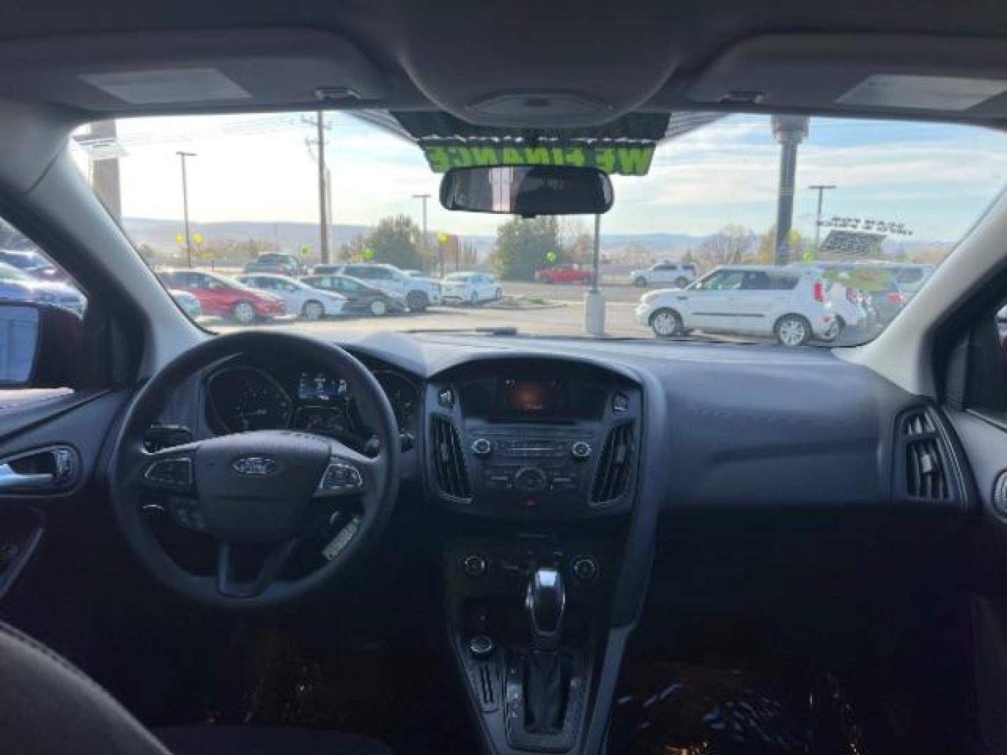 2015 Ruby Red Metallic Tinted Clearcoat /Charcoal Black Insert w/Warm Steel Surround, cloth Ford Focus SE Hatch (1FADP3K21FL) with an 2.0L L4 DOHC 16V engine, 4-Speed Automatic transmission, located at 1865 East Red Hills Pkwy, St. George, 84770, (435) 628-0023, 37.120850, -113.543640 - We specialize in helping ALL people get the best financing available. No matter your credit score, good, bad or none we can get you an amazing rate. Had a bankruptcy, divorce, or repossessions? We give you the green light to get your credit back on the road. Low down and affordable payments that fit - Photo#23