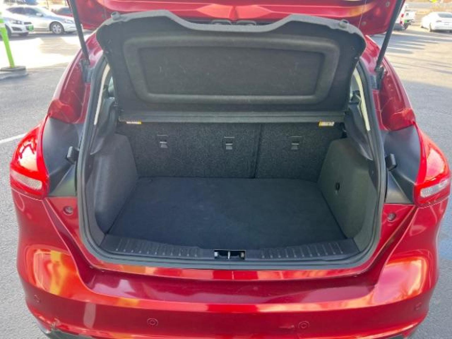 2015 Ruby Red Metallic Tinted Clearcoat /Charcoal Black Insert w/Warm Steel Surround, cloth Ford Focus SE Hatch (1FADP3K21FL) with an 2.0L L4 DOHC 16V engine, 4-Speed Automatic transmission, located at 1865 East Red Hills Pkwy, St. George, 84770, (435) 628-0023, 37.120850, -113.543640 - We specialize in helping ALL people get the best financing available. No matter your credit score, good, bad or none we can get you an amazing rate. Had a bankruptcy, divorce, or repossessions? We give you the green light to get your credit back on the road. Low down and affordable payments that fit - Photo#24