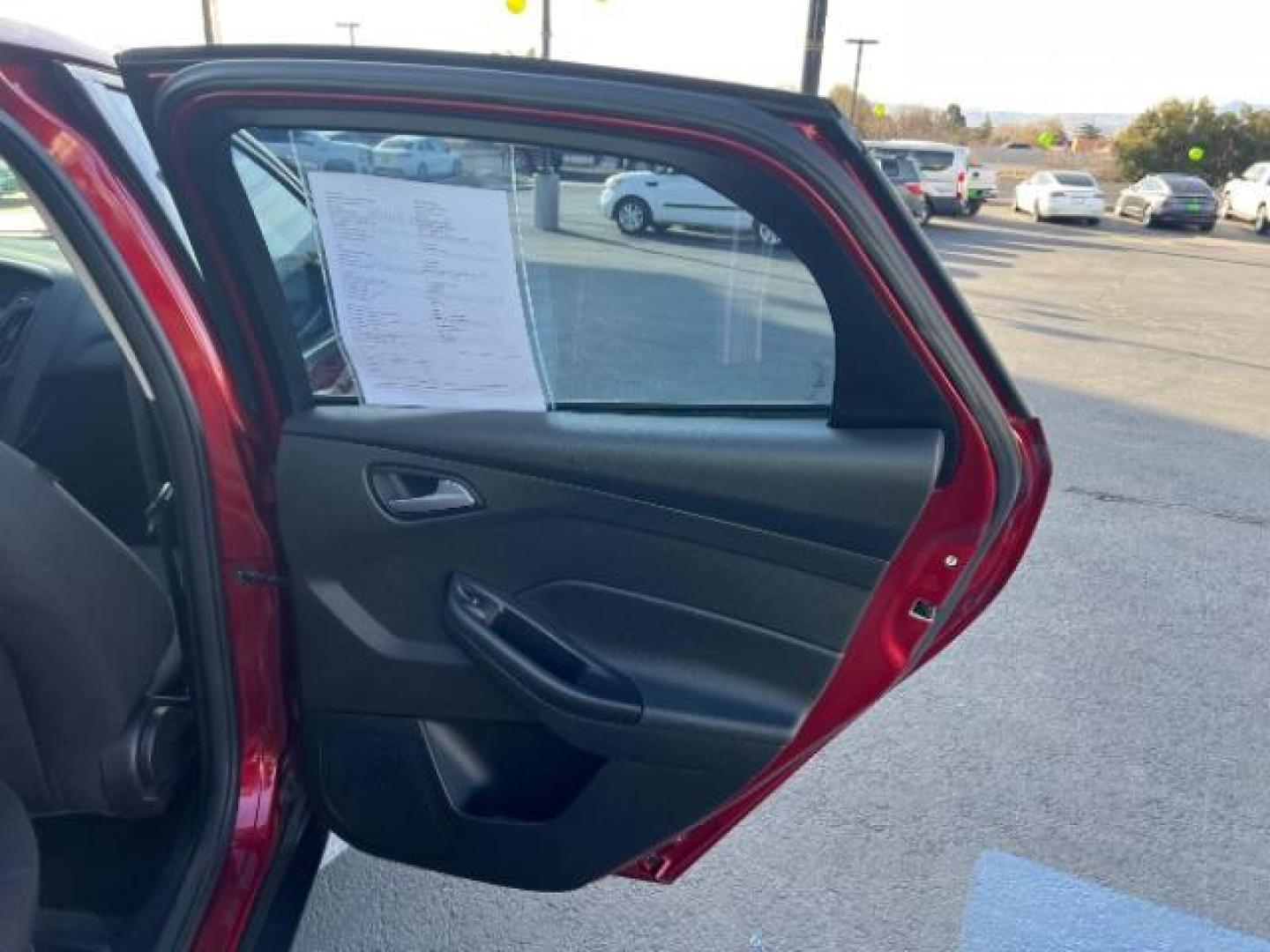 2015 Ruby Red Metallic Tinted Clearcoat /Charcoal Black Insert w/Warm Steel Surround, cloth Ford Focus SE Hatch (1FADP3K21FL) with an 2.0L L4 DOHC 16V engine, 4-Speed Automatic transmission, located at 1865 East Red Hills Pkwy, St. George, 84770, (435) 628-0023, 37.120850, -113.543640 - We specialize in helping ALL people get the best financing available. No matter your credit score, good, bad or none we can get you an amazing rate. Had a bankruptcy, divorce, or repossessions? We give you the green light to get your credit back on the road. Low down and affordable payments that fit - Photo#26
