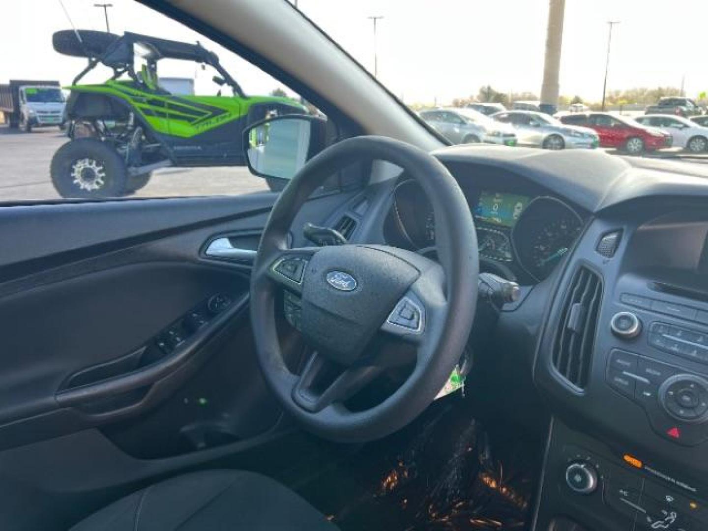 2015 Ruby Red Metallic Tinted Clearcoat /Charcoal Black Insert w/Warm Steel Surround, cloth Ford Focus SE Hatch (1FADP3K21FL) with an 2.0L L4 DOHC 16V engine, 4-Speed Automatic transmission, located at 1865 East Red Hills Pkwy, St. George, 84770, (435) 628-0023, 37.120850, -113.543640 - We specialize in helping ALL people get the best financing available. No matter your credit score, good, bad or none we can get you an amazing rate. Had a bankruptcy, divorce, or repossessions? We give you the green light to get your credit back on the road. Low down and affordable payments that fit - Photo#32