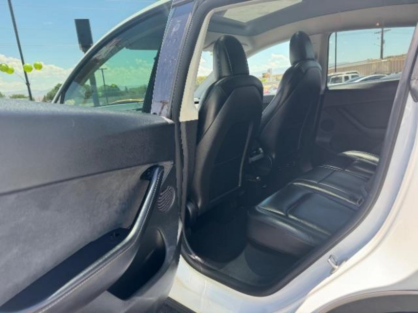 2022 Pearl White Multi-Coat /All Black Tesla Model Y Long Range (7SAYGDEE0NF) with an ELECTRIC engine, 1-Speed Automatic transmission, located at 1865 East Red Hills Pkwy, St. George, 84770, (435) 628-0023, 37.120850, -113.543640 - SOLD - But we can find you any Tesla, Call us! ***Purchase price AFTER $4k rebate has been transferred to dealership*** This allows us to reduce the asking price from $28,995 (without tax rebate) to be under the $25k threshold. Visit Energy.gov for full rules. Beautiful LONG RANGE ALL WHEEL DRI - Photo#20
