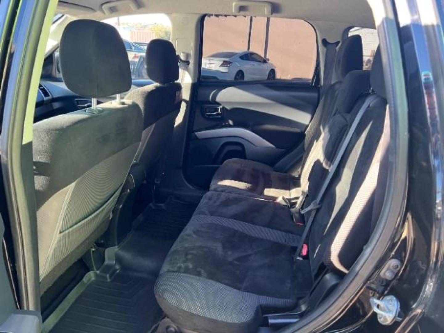 2012 Labrador Black Pearl /Black Cloth Interior Mitsubishi Outlander ES 2WD (JA4AS2AW2CU) with an 2.4L L4 DOHC 16V engine, Continuously Variable Transmission transmission, located at 940 North Main Street, Cedar City, UT, 84720, (435) 628-0023, 37.692936, -113.061897 - We specialize in helping ALL people get the best financing available. No matter your credit score, good, bad or none we can get you an amazing rate. Had a bankruptcy, divorce, or repossessions? We give you the green light to get your credit back on the road. Low down and affordable payments that fit - Photo#21