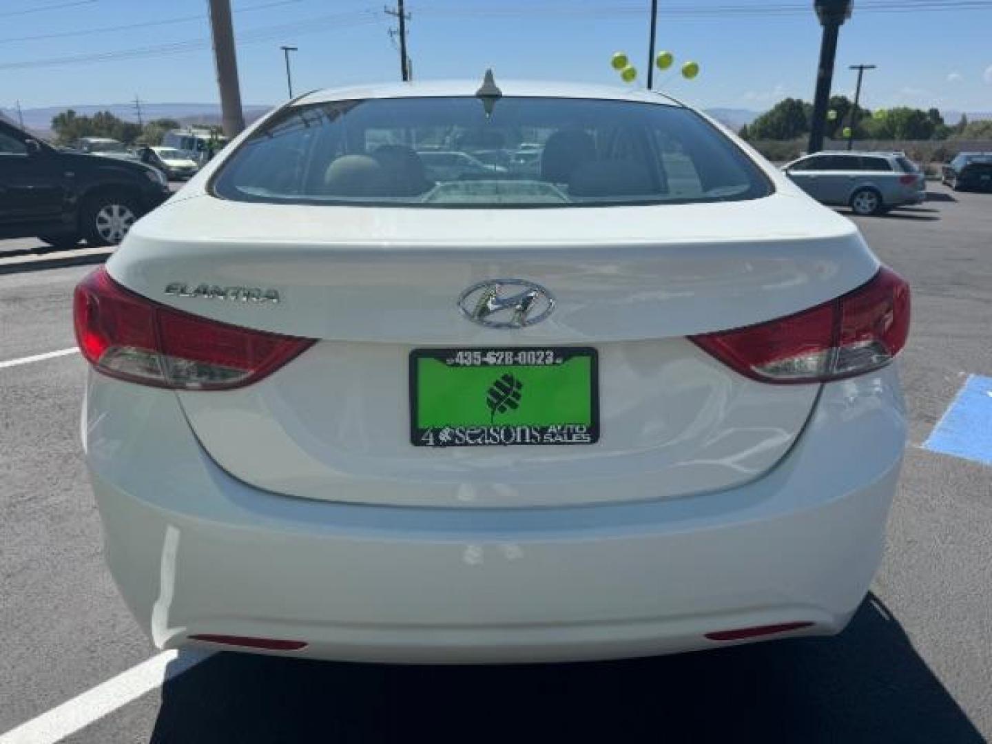 2013 White /Beige Leather Interior Hyundai Elantra Limited (5NPDH4AE3DH) with an 1.8L L4 DOHC 16V engine, 6-Speed Automatic transmission, located at 940 North Main Street, Cedar City, UT, 84720, (435) 628-0023, 37.692936, -113.061897 - We specialize in helping ALL people get the best financing available. No matter your credit score, good, bad or none we can get you an amazing rate. Had a bankruptcy, divorce, or repossessions? We give you the green light to get your credit back on the road. Low down and affordable payments that fit - Photo#5