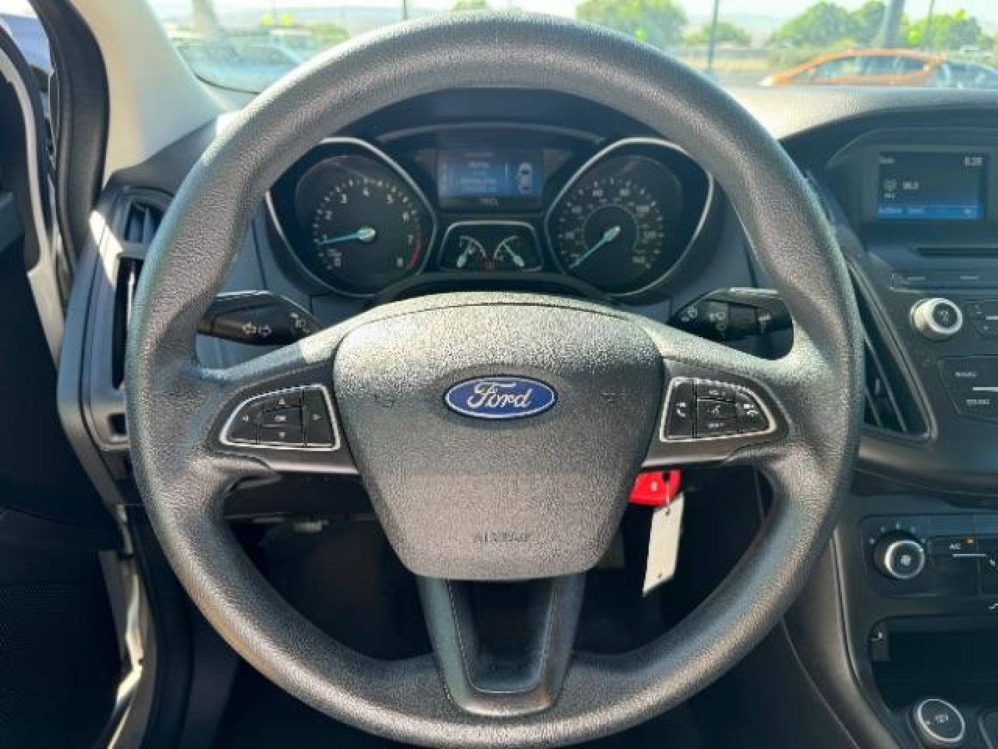 2015 Ingot Silver Metallic /Charcoal Black Insert w/Warm Steel Surround, cloth Ford Focus S Sedan (1FADP3E23FL) with an 2.0L L4 DOHC 16V engine, 5-Speed Manual transmission, located at 940 North Main Street, Cedar City, UT, 84720, (435) 628-0023, 37.692936, -113.061897 - We specialize in helping ALL people get the best financing available. No matter your credit score, good, bad or none we can get you an amazing rate. Had a bankruptcy, divorce, or repossessions? We give you the green light to get your credit back on the road. Low down and affordable payments that fit - Photo#15
