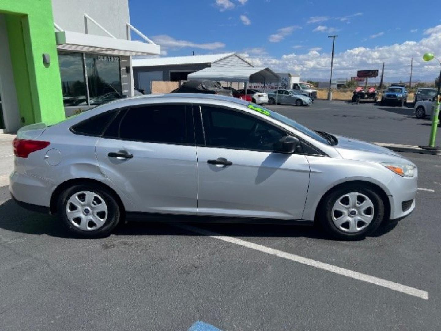 2015 Ingot Silver Metallic /Charcoal Black Insert w/Warm Steel Surround, cloth Ford Focus S Sedan (1FADP3E23FL) with an 2.0L L4 DOHC 16V engine, Automatic transmission, located at 1865 East Red Hills Pkwy, St. George, 84770, (435) 628-0023, 37.120850, -113.543640 - Versatile Southern Utah travel starts with this 2015 Ford Focus S Sedan. Its 2.0L 4-cylinder engine, automatic transmission, and front-wheel drive make it a smart fit for commuting, errands, and easy Southern Utah road trips. With 150,175 miles, this Focus is ready for its next adventure. The S Sed- Photo#7