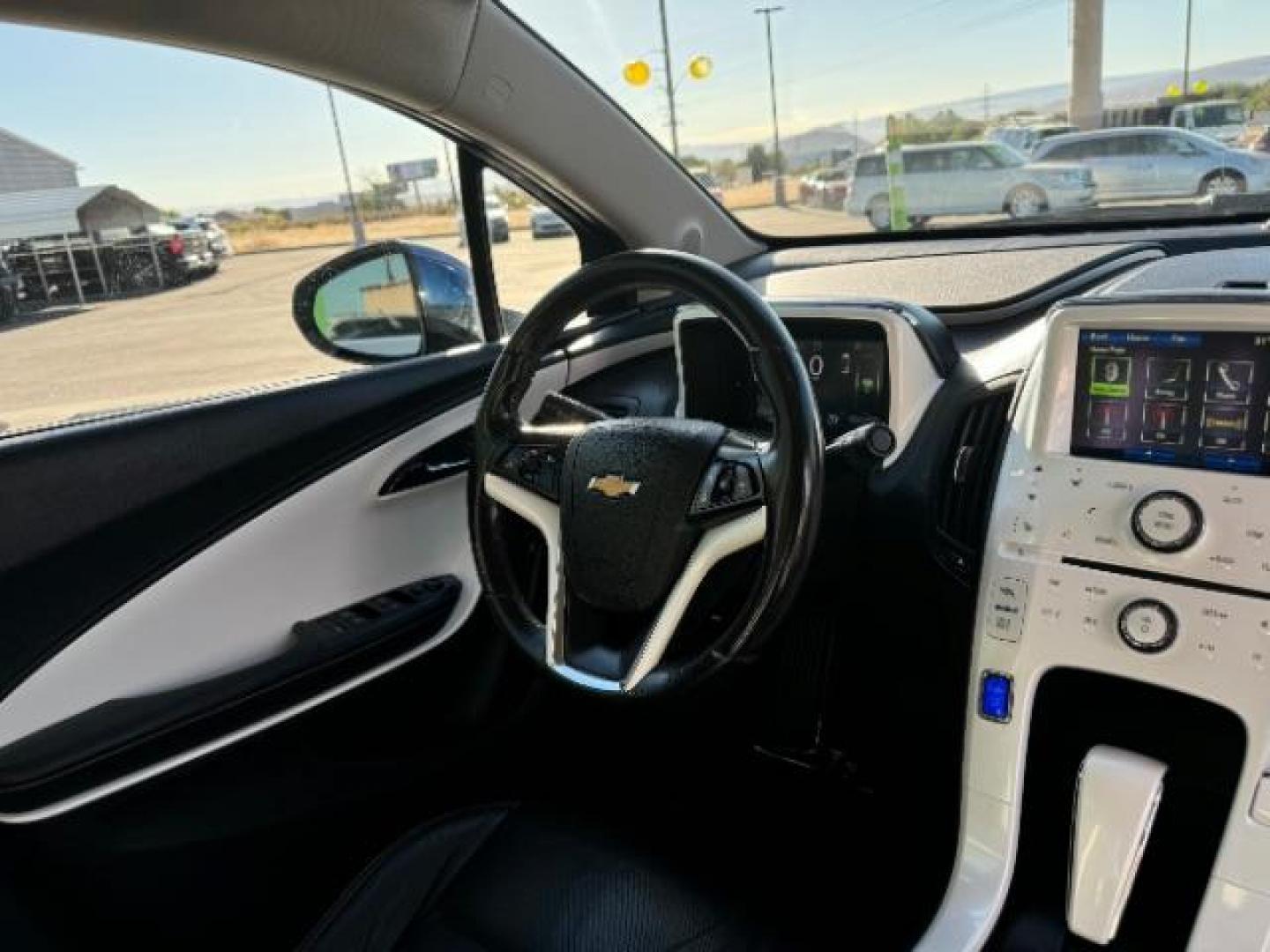 2012 Blue Topaz Metallic /Jet Black and Ceramic White Leather Interior Chevrolet Volt Premium (1G1RB6E44CU) with an 1.4L L4 DOHC 16V PLUG-IN HYBRID engine, Continuously Variable Transmission transmission, located at 940 North Main Street, Cedar City, UT, 84720, (435) 628-0023, 37.692936, -113.061897 - Photo#29