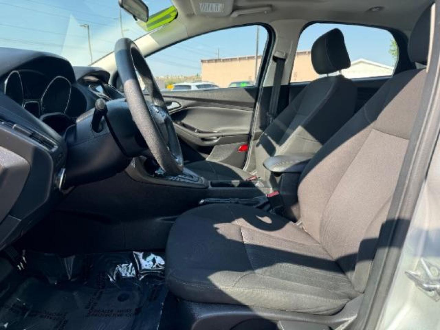 2017 Ingot Silver Metallic /Charcoal Black Insert w/Warm Steel Surround, cloth Ford Focus SEL Sedan (1FADP3H27HL) with an 2.0L L4 DOHC 16V engine, located at 940 North Main Street, Cedar City, UT, 84720, (435) 628-0023, 37.692936, -113.061897 - Photo#15