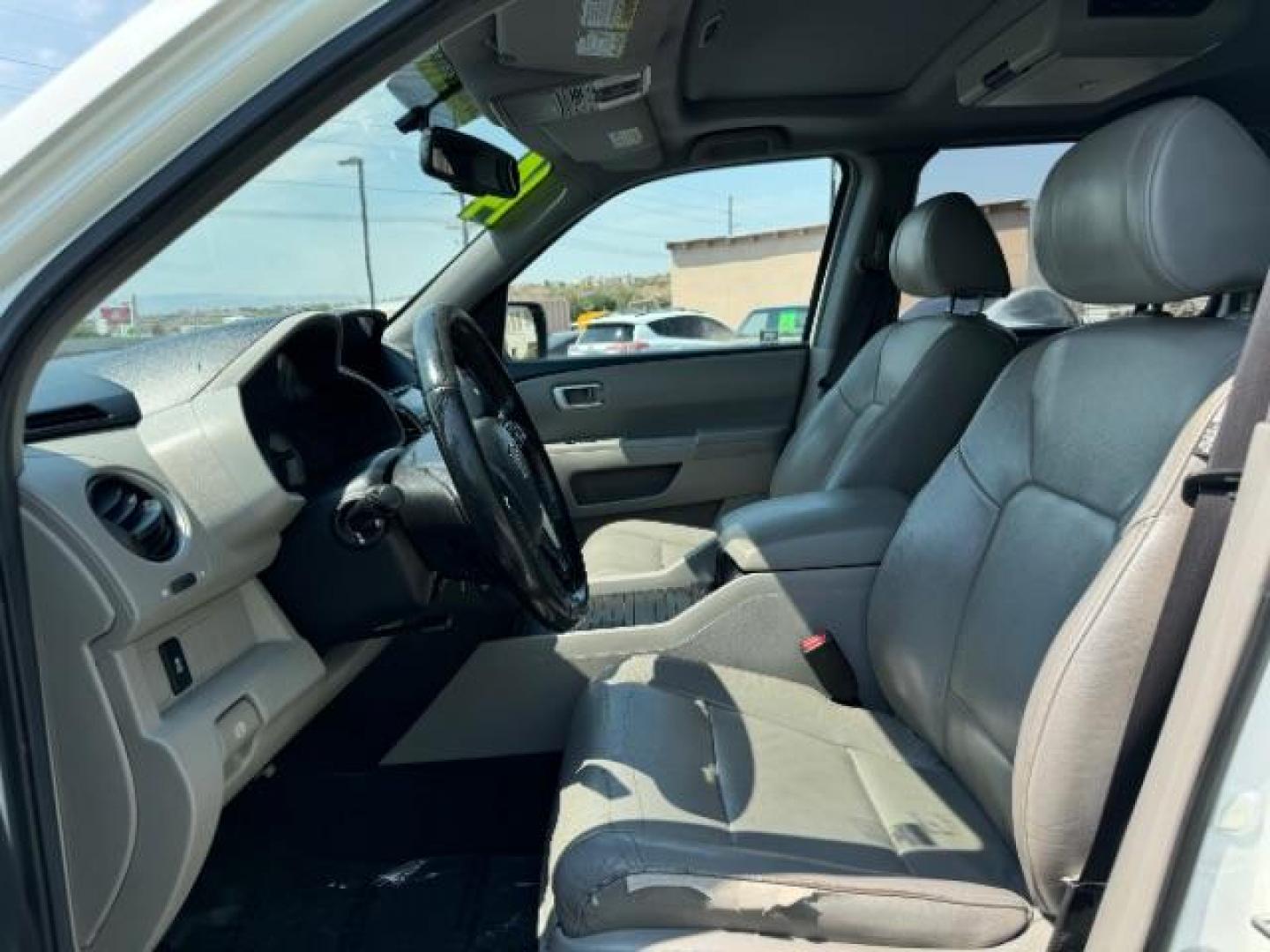 2014 Taffeta White /Black Honda Pilot EX-L 2WD 5-Spd AT with Navigation (5FNYF3H75EB) with an 3.5L V6 SOHC 24V engine, 5-Speed Automatic transmission, located at 940 North Main Street, Cedar City, UT, 84720, (435) 628-0023, 37.692936, -113.061897 - We specialize in helping ALL people get the best financing available. No matter your credit score, good, bad or none we can get you an amazing rate. Had a bankruptcy, divorce, or repossessions? We give you the green light to get your credit back on the road. Low down and affordable payments that fit - Photo#15