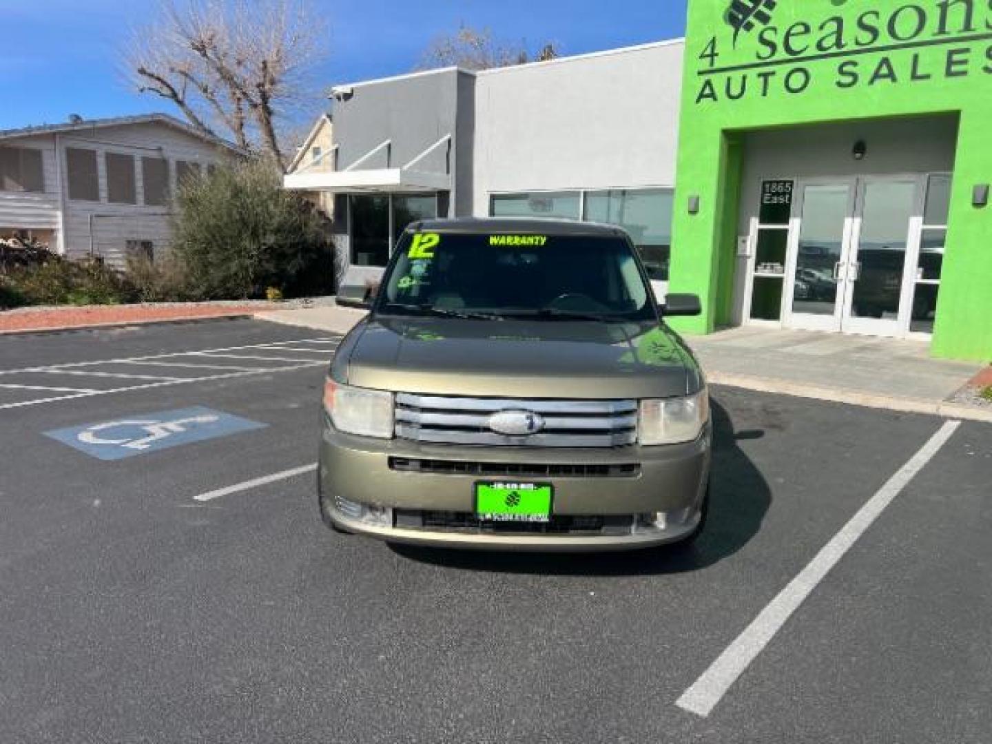 2012 Ginger Ale Metallic /Charcoal Black Leather Interior Ford Flex SEL AWD (2FMHK6CC9CB) with an 3.5L V6 DOHC 24V engine, 6-Speed Automatic Overdrive transmission, located at 940 North Main Street, Cedar City, UT, 84720, (435) 628-0023, 37.692936, -113.061897 - We specialize in helping ALL people get the best financing available. No matter your credit score, good, bad or none we can get you an amazing rate. Had a bankruptcy, divorce, or repossessions? We give you the green light to get your credit back on the road. Low down and affordable payments that fit - Photo#1