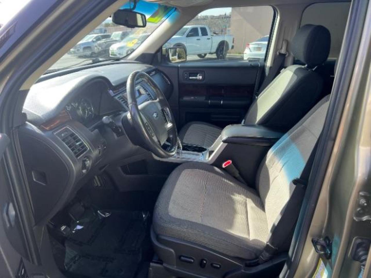 2012 Ginger Ale Metallic /Charcoal Black Leather Interior Ford Flex SEL AWD (2FMHK6CC9CB) with an 3.5L V6 DOHC 24V engine, 6-Speed Automatic Overdrive transmission, located at 940 North Main Street, Cedar City, UT, 84720, (435) 628-0023, 37.692936, -113.061897 - We specialize in helping ALL people get the best financing available. No matter your credit score, good, bad or none we can get you an amazing rate. Had a bankruptcy, divorce, or repossessions? We give you the green light to get your credit back on the road. Low down and affordable payments that fit - Photo#14
