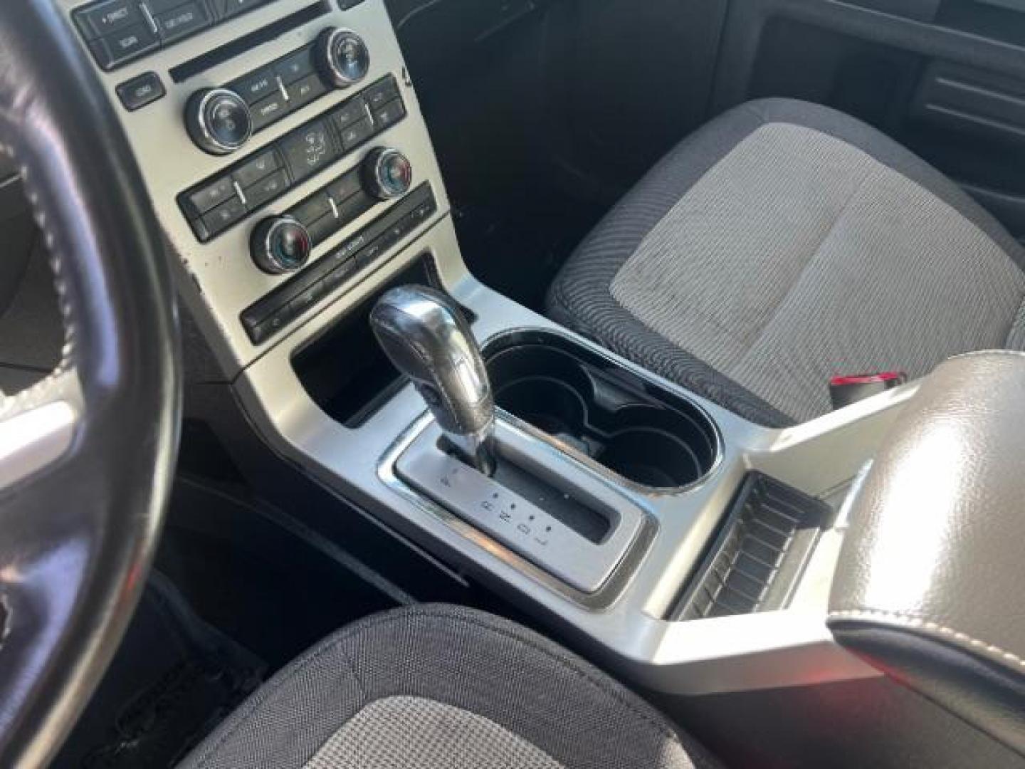 2012 Ginger Ale Metallic /Charcoal Black Leather Interior Ford Flex SEL AWD (2FMHK6CC9CB) with an 3.5L V6 DOHC 24V engine, 6-Speed Automatic Overdrive transmission, located at 940 North Main Street, Cedar City, UT, 84720, (435) 628-0023, 37.692936, -113.061897 - We specialize in helping ALL people get the best financing available. No matter your credit score, good, bad or none we can get you an amazing rate. Had a bankruptcy, divorce, or repossessions? We give you the green light to get your credit back on the road. Low down and affordable payments that fit - Photo#18