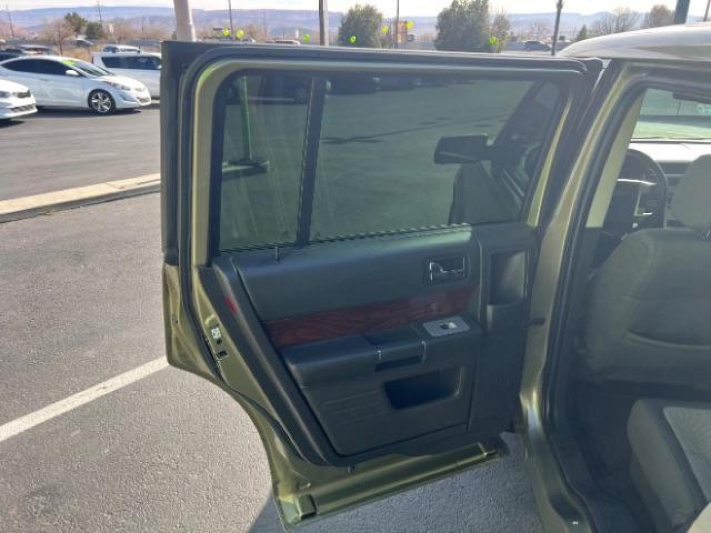 2012 Ginger Ale Metallic /Charcoal Black Leather Interior Ford Flex SEL AWD (2FMHK6CC9CB) with an 3.5L V6 DOHC 24V engine, 6-Speed Automatic Overdrive transmission, located at 940 North Main Street, Cedar City, UT, 84720, (435) 628-0023, 37.692936, -113.061897 - We specialize in helping ALL people get the best financing available. No matter your credit score, good, bad or none we can get you an amazing rate. Had a bankruptcy, divorce, or repossessions? We give you the green light to get your credit back on the road. Low down and affordable payments that fit - Photo#20