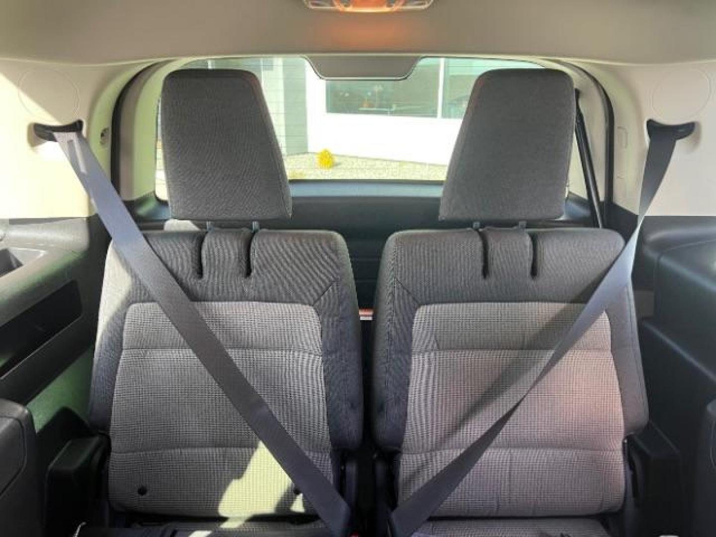 2012 Ginger Ale Metallic /Charcoal Black Leather Interior Ford Flex SEL AWD (2FMHK6CC9CB) with an 3.5L V6 DOHC 24V engine, 6-Speed Automatic Overdrive transmission, located at 940 North Main Street, Cedar City, UT, 84720, (435) 628-0023, 37.692936, -113.061897 - We specialize in helping ALL people get the best financing available. No matter your credit score, good, bad or none we can get you an amazing rate. Had a bankruptcy, divorce, or repossessions? We give you the green light to get your credit back on the road. Low down and affordable payments that fit - Photo#25