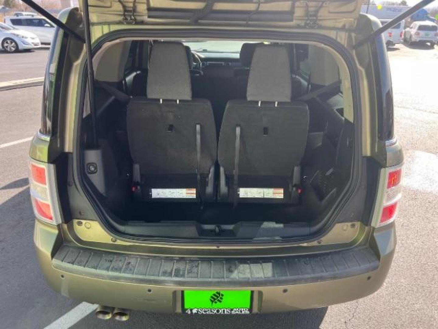 2012 Ginger Ale Metallic /Charcoal Black Leather Interior Ford Flex SEL AWD (2FMHK6CC9CB) with an 3.5L V6 DOHC 24V engine, 6-Speed Automatic Overdrive transmission, located at 940 North Main Street, Cedar City, UT, 84720, (435) 628-0023, 37.692936, -113.061897 - We specialize in helping ALL people get the best financing available. No matter your credit score, good, bad or none we can get you an amazing rate. Had a bankruptcy, divorce, or repossessions? We give you the green light to get your credit back on the road. Low down and affordable payments that fit - Photo#27