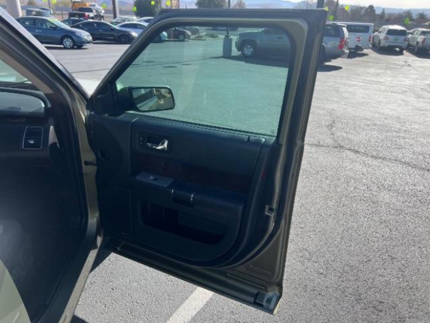 2012 Ginger Ale Metallic /Charcoal Black Leather Interior Ford Flex SEL AWD (2FMHK6CC9CB) with an 3.5L V6 DOHC 24V engine, 6-Speed Automatic Overdrive transmission, located at 940 North Main Street, Cedar City, UT, 84720, (435) 628-0023, 37.692936, -113.061897 - We specialize in helping ALL people get the best financing available. No matter your credit score, good, bad or none we can get you an amazing rate. Had a bankruptcy, divorce, or repossessions? We give you the green light to get your credit back on the road. Low down and affordable payments that fit - Photo#30