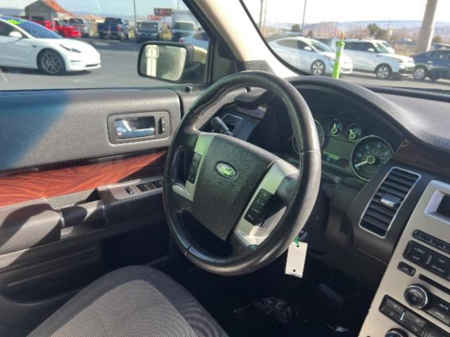 2012 Ginger Ale Metallic /Charcoal Black Leather Interior Ford Flex SEL AWD (2FMHK6CC9CB) with an 3.5L V6 DOHC 24V engine, 6-Speed Automatic Overdrive transmission, located at 940 North Main Street, Cedar City, UT, 84720, (435) 628-0023, 37.692936, -113.061897 - We specialize in helping ALL people get the best financing available. No matter your credit score, good, bad or none we can get you an amazing rate. Had a bankruptcy, divorce, or repossessions? We give you the green light to get your credit back on the road. Low down and affordable payments that fit - Photo#33