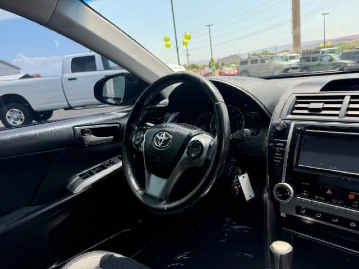 2013 Attitude Black Metallic /Black Toyota Camry SE (4T1BF1FK6DU) with an 2.5L L4 DOHC 16V engine, 6-Speed Automatic transmission, located at 940 North Main Street, Cedar City, UT, 84720, (435) 628-0023, 37.692936, -113.061897 - We specialize in helping ALL people get the best financing available. No matter your credit score, good, bad or none we can get you an amazing rate. Had a bankruptcy, divorce, or repossessions? We give you the green light to get your credit back on the road. Low down and affordable payments that fit - Photo#33
