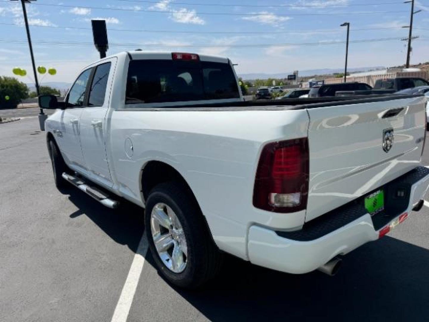 2016 Bright White Clear Coat /Black, leather RAM 1500 Sport Quad Cab 4WD (1C6RR7HT2GS) with an 5.7L V8 OHV 16V engine, 8-Speed Automatic transmission, located at 940 North Main Street, Cedar City, UT, 84720, (435) 628-0023, 37.692936, -113.061897 - Photo#4