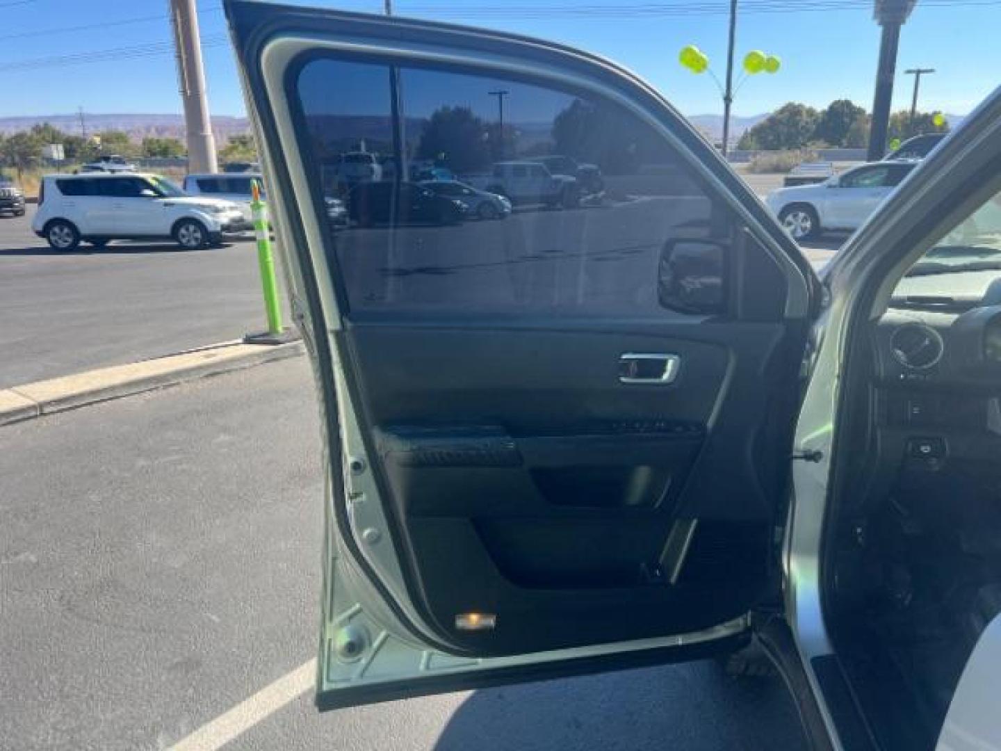 2011 Alabaster Silver Metallic /Gray Cloth Interior Honda Pilot LX 2WD 5-Spd AT (5FNYF3H23BB) with an 3.5L V6 SOHC 24V engine, 5-Speed Automatic transmission, located at 1865 East Red Hills Pkwy, St. George, 84770, (435) 628-0023, 37.120850, -113.543640 - We specialize in helping ALL people get the best financing available. No matter your credit score, good, bad or none we can get you an amazing rate. Had a bankruptcy, divorce, or repossessions? We give you the green light to get your credit back on the road. Low down and affordable payments that fit - Photo#12